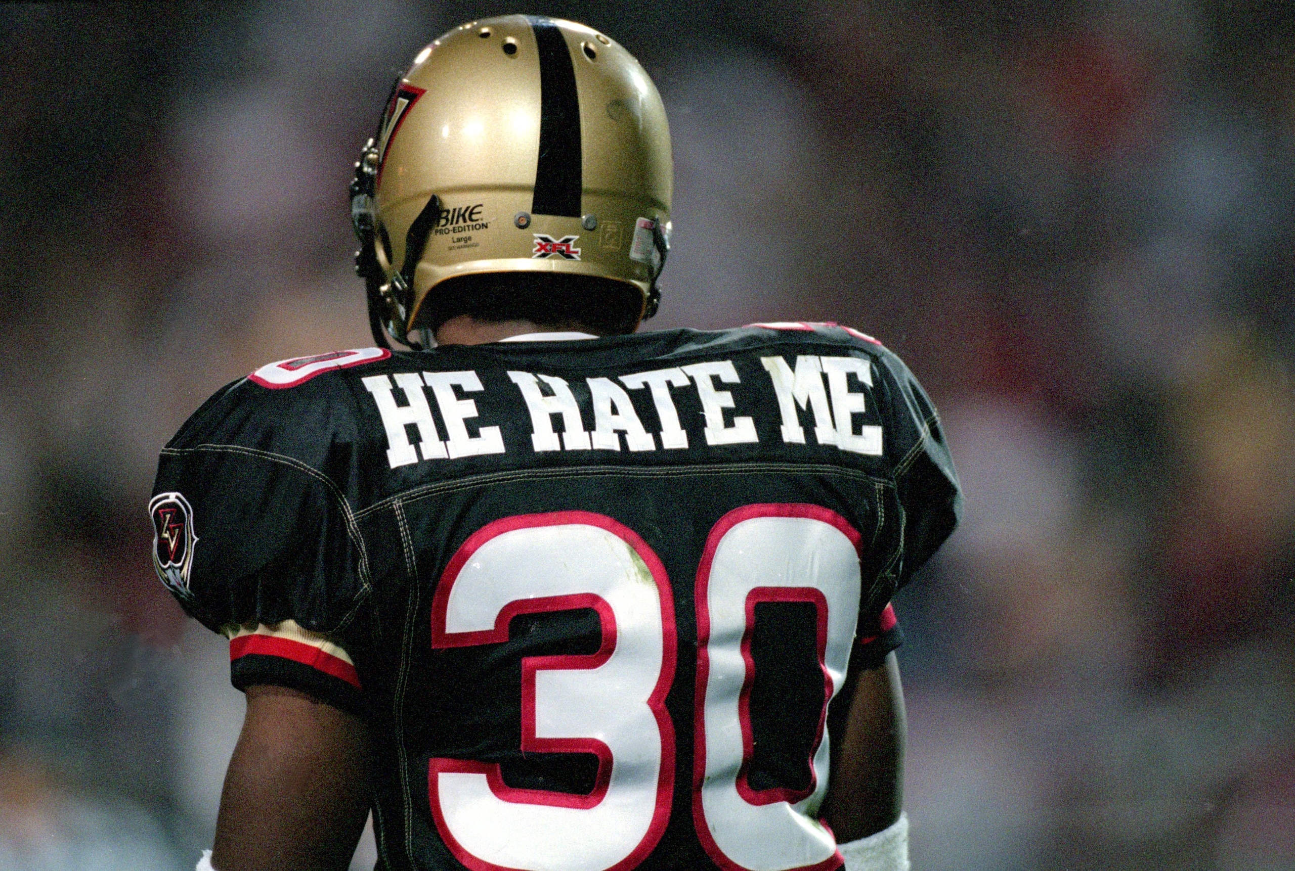 3 Feb 2001:  A rear view of Rod Smart #30 of the Las Vegas Outlaws walking on the field during the game against the New York/New Jersey Hitmen at the Sam Boyd Stadium in Las Vegas, Nevada.  The Outlaws defeated the Hitmen 19-0.Mandatory Credit: Todd Warsh