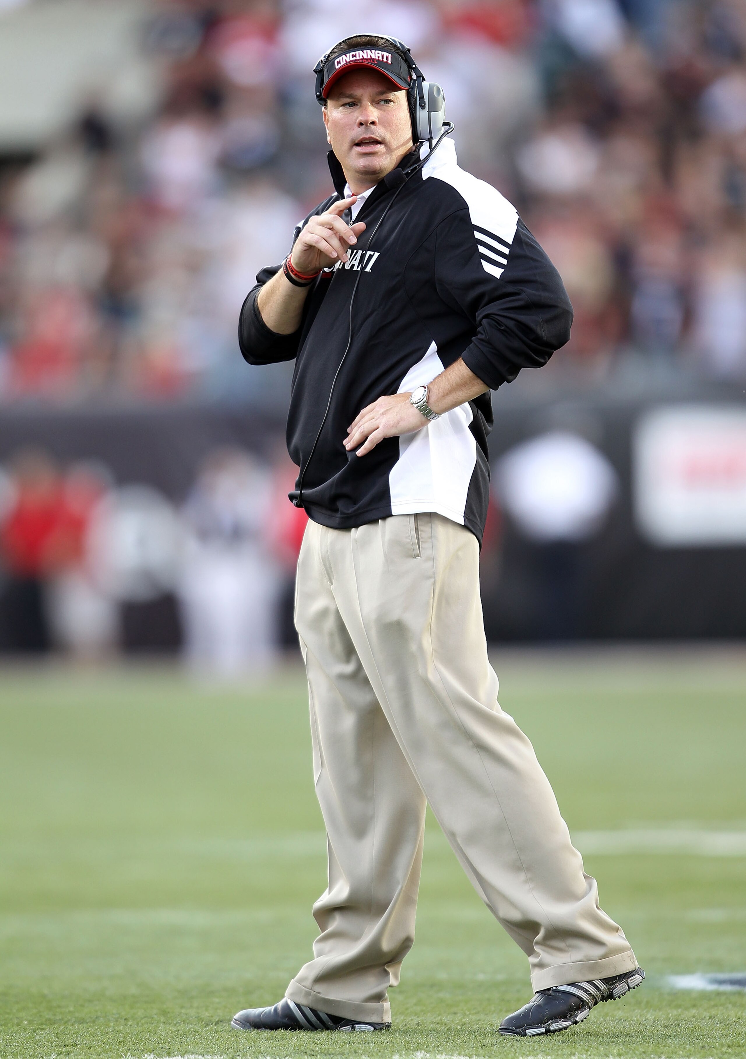 CINCINNATI - SEPTEMBER 25:  Butch Jones the Head Coach of the Cincinnati Bearcats gives instructions to his team during the game against the Oklahoma Sooners at Paul Brown Stadium on September 25, 2010 in Cincinnati, Ohio.  (Photo by Andy Lyons/Getty Imag