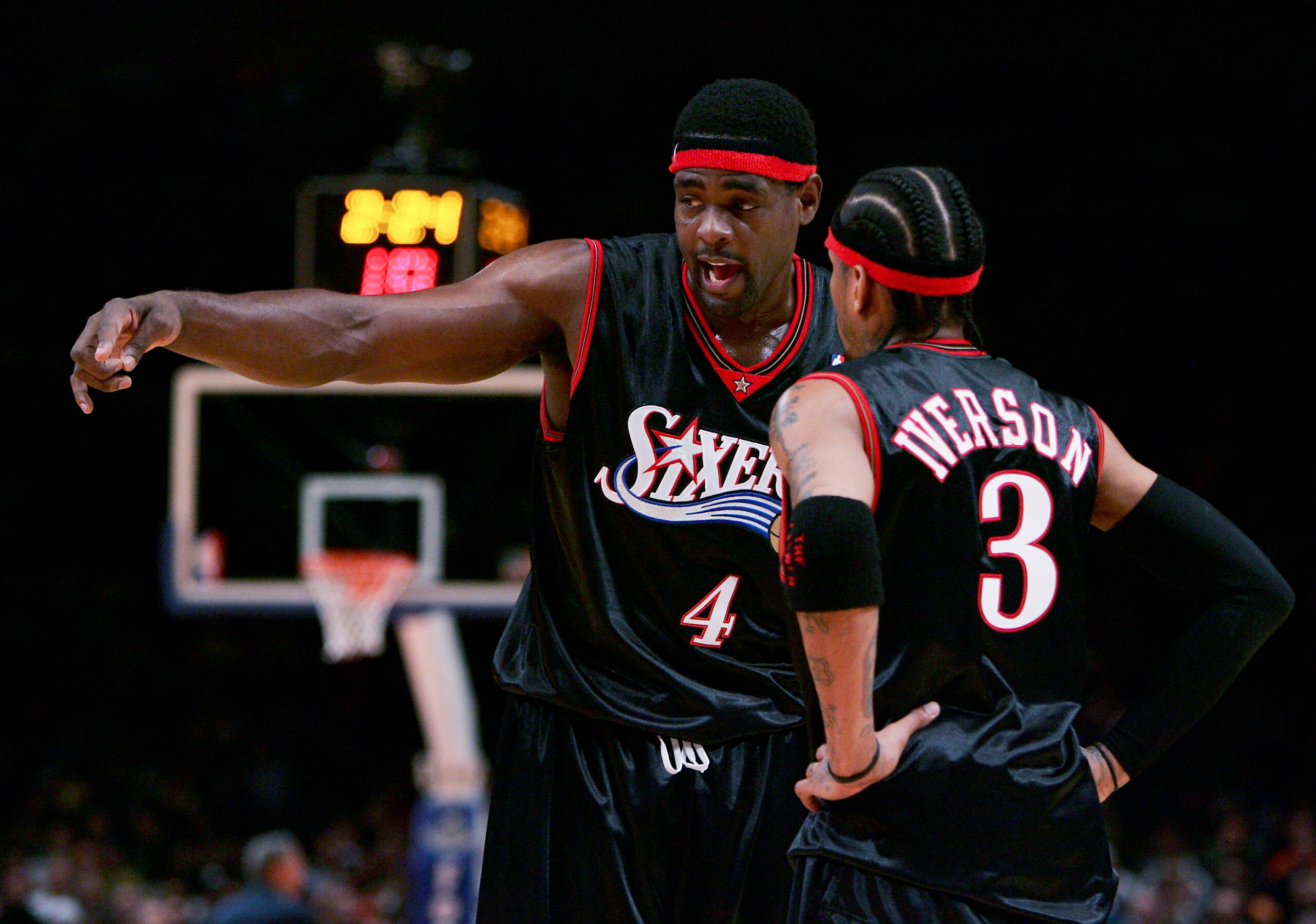 NEW YORK - NOVEMBER 26: Chris Webber #4 talks with Allen Iverson #3 of the Philadelphia 76ers talks in their game against the New York Knicks on November 26, 2005 at Madison Square Garden in New York City. NOTE TO USER: User expressly acknowledges and agr