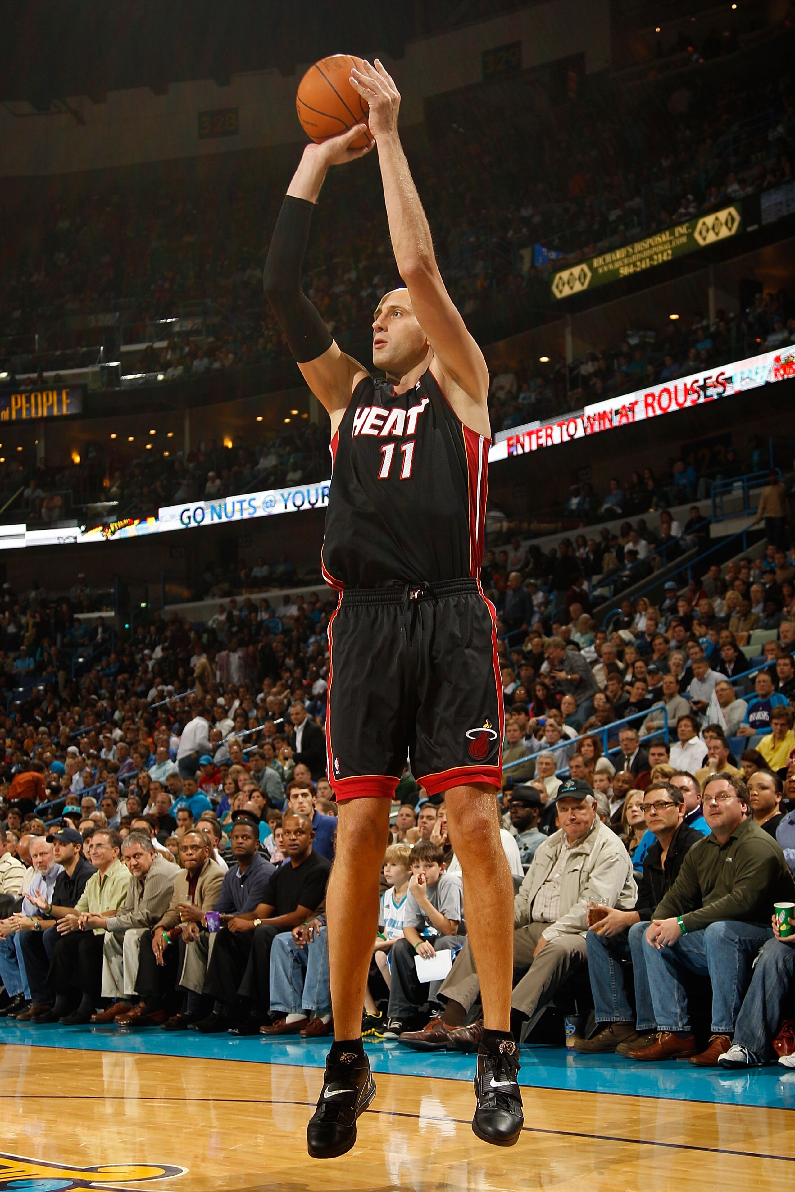 NEW ORLEANS - NOVEMBER 05:  Zydrunas Ilgauskas #11 of the Miami Heat shoots the ball during the game against the New Orleans Hornets at the New Orleans Arena on November 5, 2010 in New Orleans, Louisiana.  The Hornets defeated the Heat 96-93.    NOTE TO U