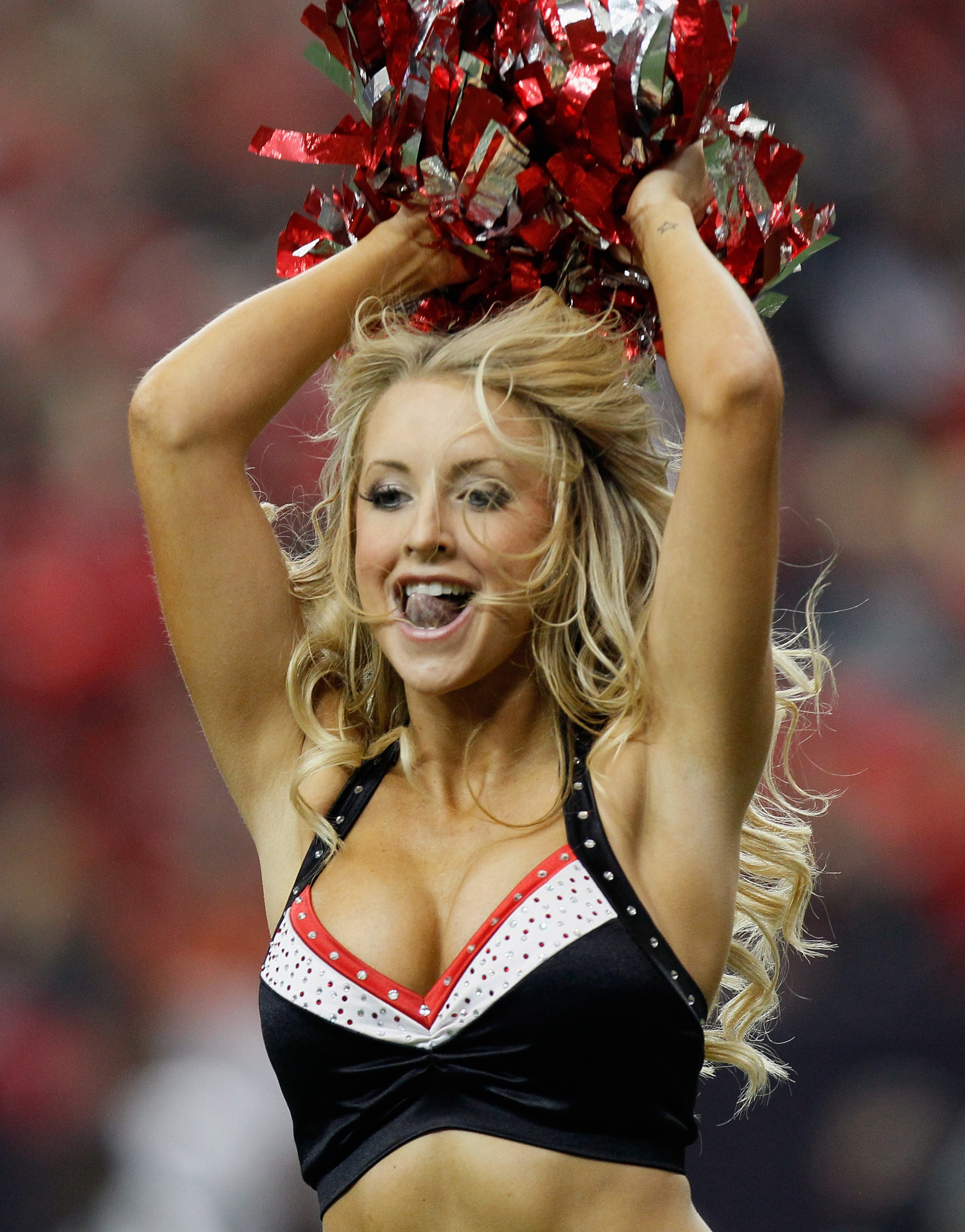 ATLANTA - NOVEMBER 07:  An Atlanta Falcons cheerleader peforms during the game against the Tampa Bay Buccaneers at Georgia Dome on November 7, 2010 in Atlanta, Georgia.  (Photo by Kevin C. Cox/Getty Images)