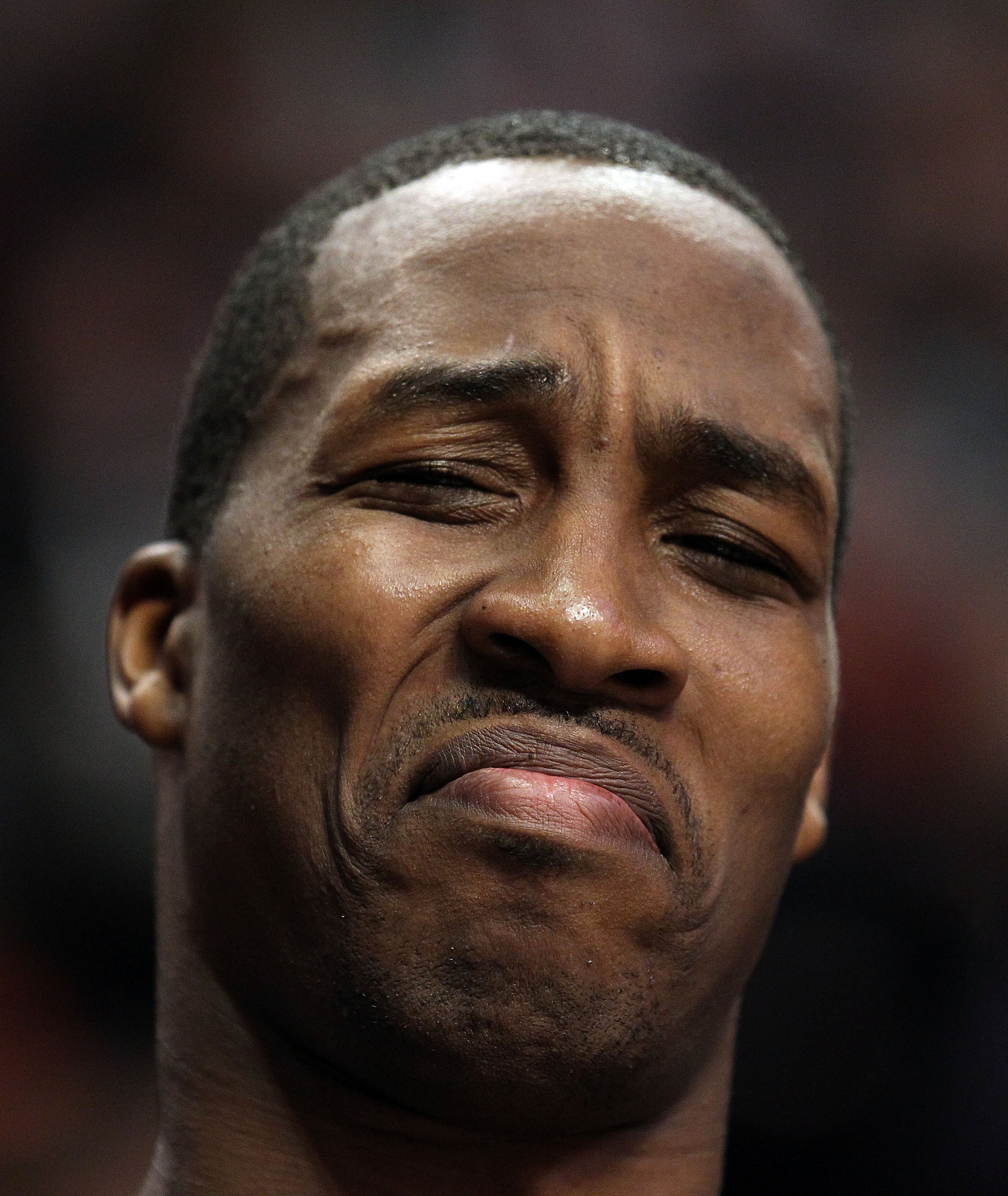 CHICAGO, IL - JANUARY 28: Dwight Howard #12 of the Orlando Magic reacts to the taunts of a fan as he sits on the bench during a game against the Chicago Bulls at the United Center on January 28, 2011 in Chicago, Illinois. The Bulls defeated the Magic 99-9