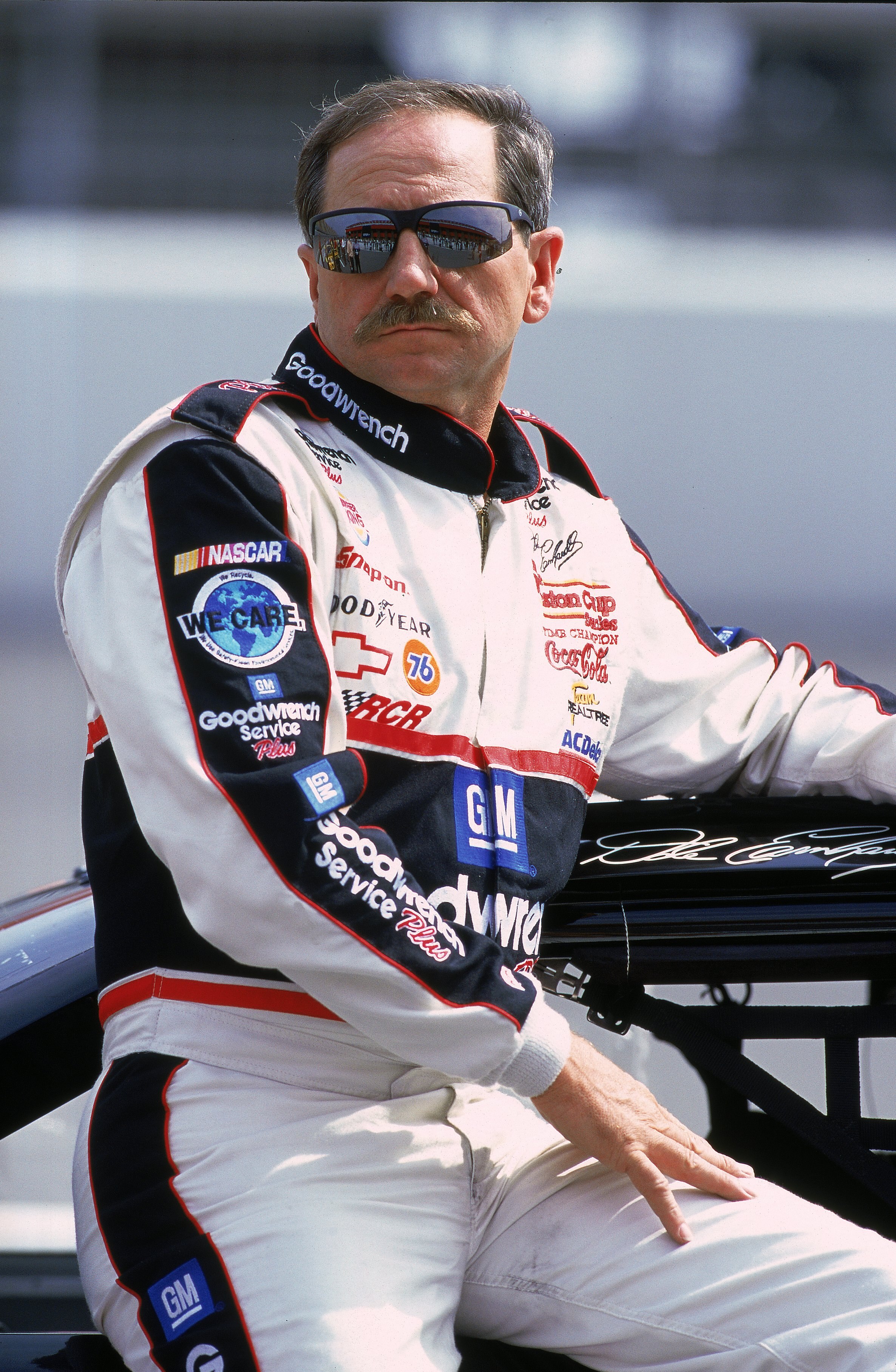 29 Apr 2000: Dale Earnhardt Sr. #3 relaxes while watching the action during the NAPA Auto Parts 500, Part of the NASCAR Winston Cup Series, at the California Speedway in Fontana, California. Mandatory Credit: Donald Miralle  /Allsport