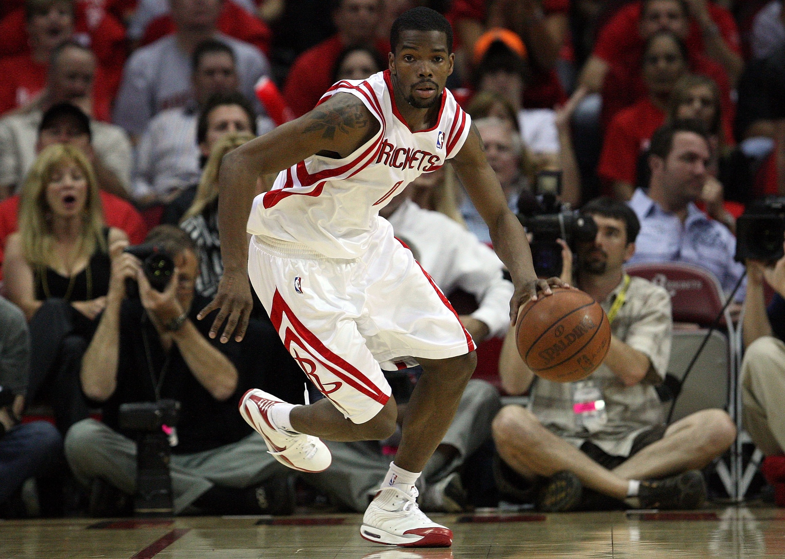 HOUSTON - APRIL 24:  Guard Aaron Brooks #0 of the Houston Rockets during play against the Portland Trail Blazers in Game Three of the Western Conference Quarterfinals during the 2009 NBA Playoffs at Toyota Center on April 24, 2009 in Houston, Texas. NOTE
