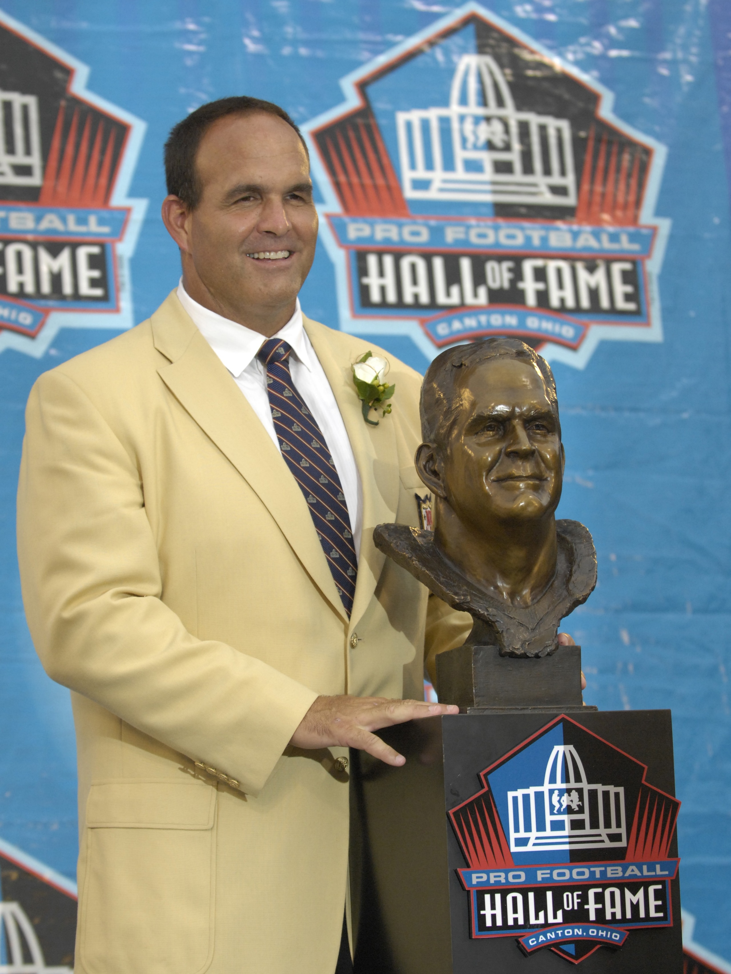 CANTON, OH - AUGUST 04: Bruce Matthews poses with his bust during the Class of 2007 Pro Football Hall of Fame Enshrinement Ceremony August 4, 2007 in Canton, Ohio. (Photo by Al Messerschmidt/Getty Images)