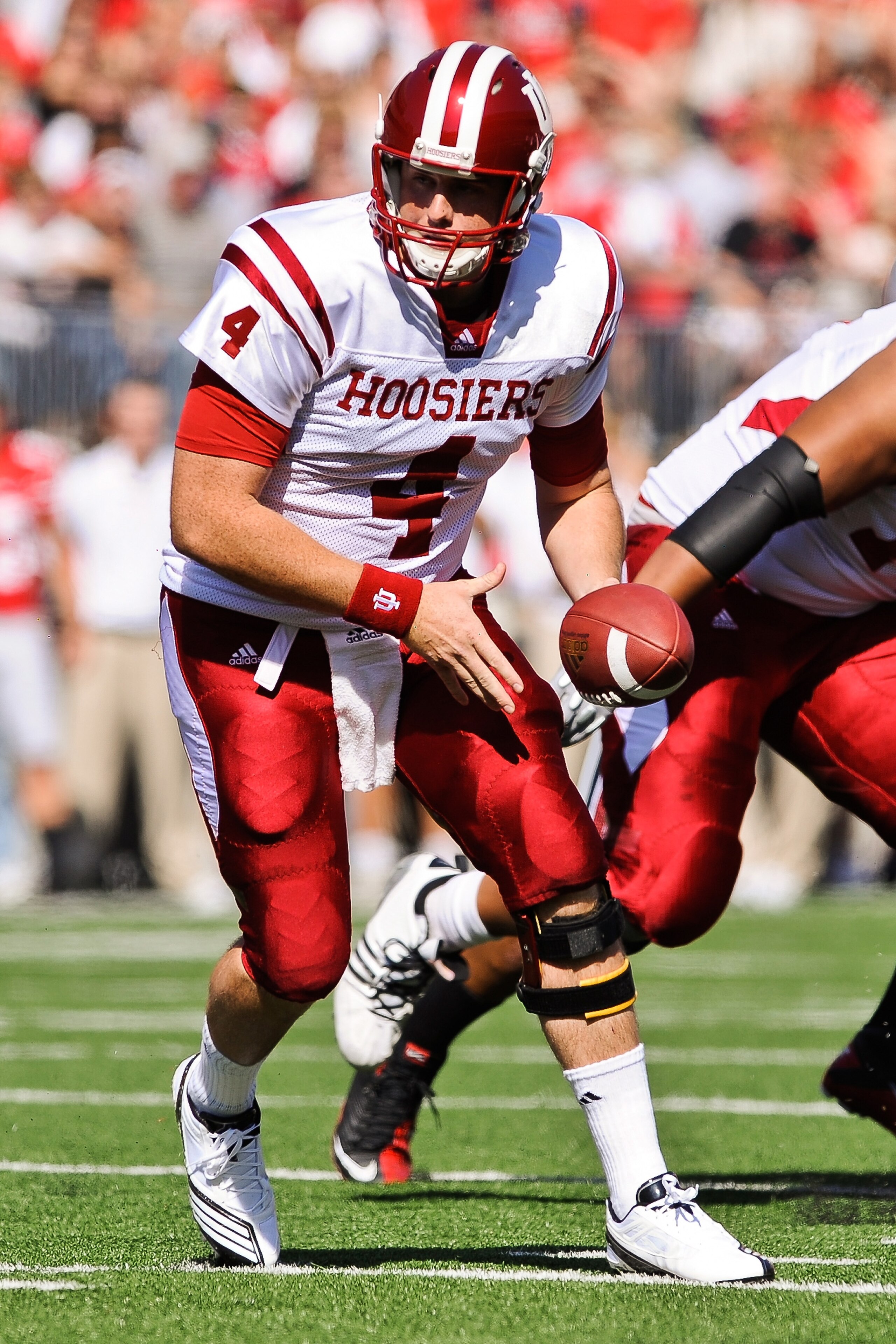 COLUMBUS, OH - OCTOBER 9:  Quarterback Ben Chappell #4 of the Indiana Hoosiers hands off against the Ohio State Buckeyes at Ohio Stadium on October 9, 2010 in Columbus, Ohio.  (Photo by Jamie Sabau/Getty Images)