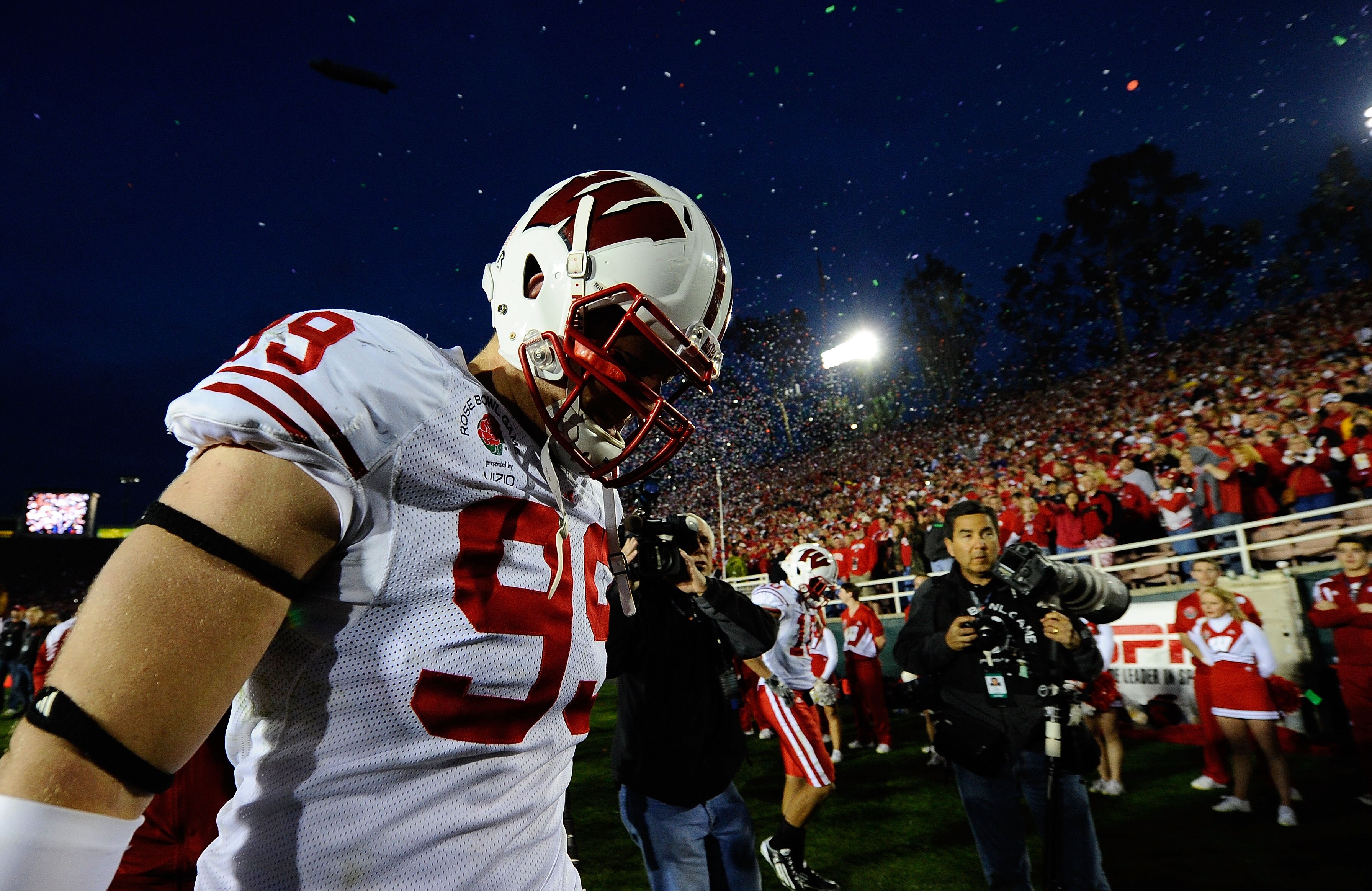 PASADENA, CA - JANUARY 01:  Defensive lineman J.J. Watt #99 of the Wisconsin Badgers walks off the field after losing 21-19 to the TCU Horned Frogs in the 97th Rose Bowl game on January 1, 2011 in Pasadena, California.  (Photo by Kevork Djansezian/Getty I