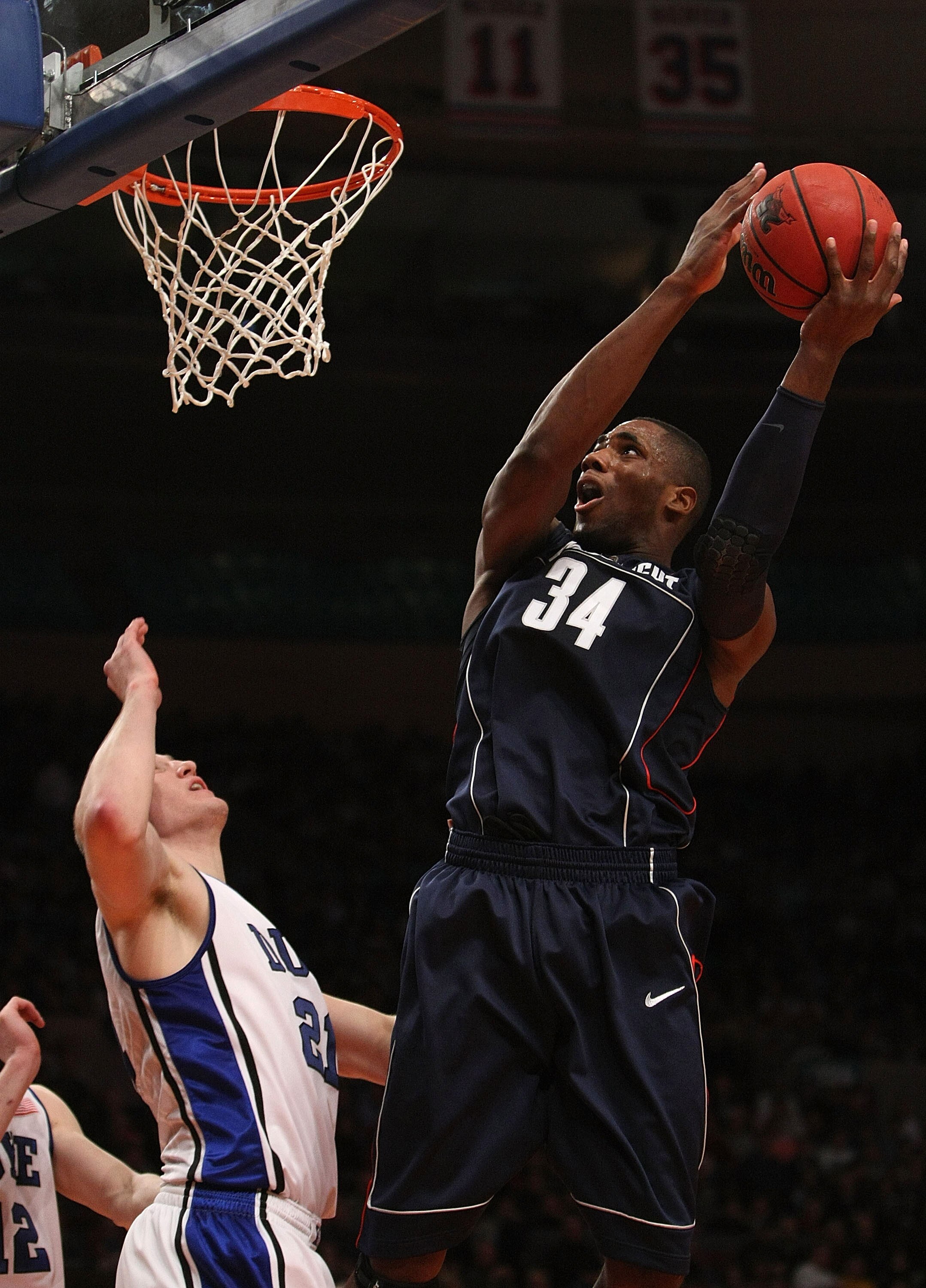 NEW YORK - NOVEMBER 27: Alex Oriakhi #34 of the Connecticut Huskies shoots the ball against the Duke Blue Devils during the Championship game at Madison Square Garden on November 27, 2009 in New York, New York.  (Photo by Nick Laham/Getty Images)