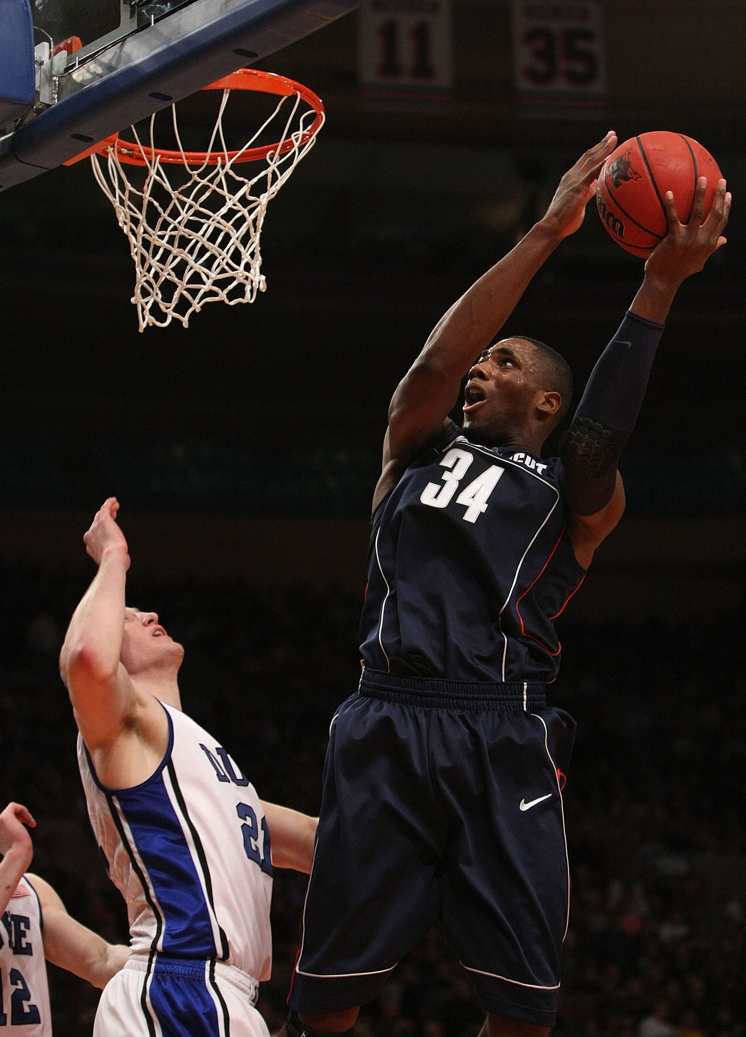 NEW YORK - NOVEMBER 27: Alex Oriakhi #34 of the Connecticut Huskies shoots the ball against the Duke Blue Devils during the Championship game at Madison Square Garden on November 27, 2009 in New York, New York.  (Photo by Nick Laham/Getty Images)