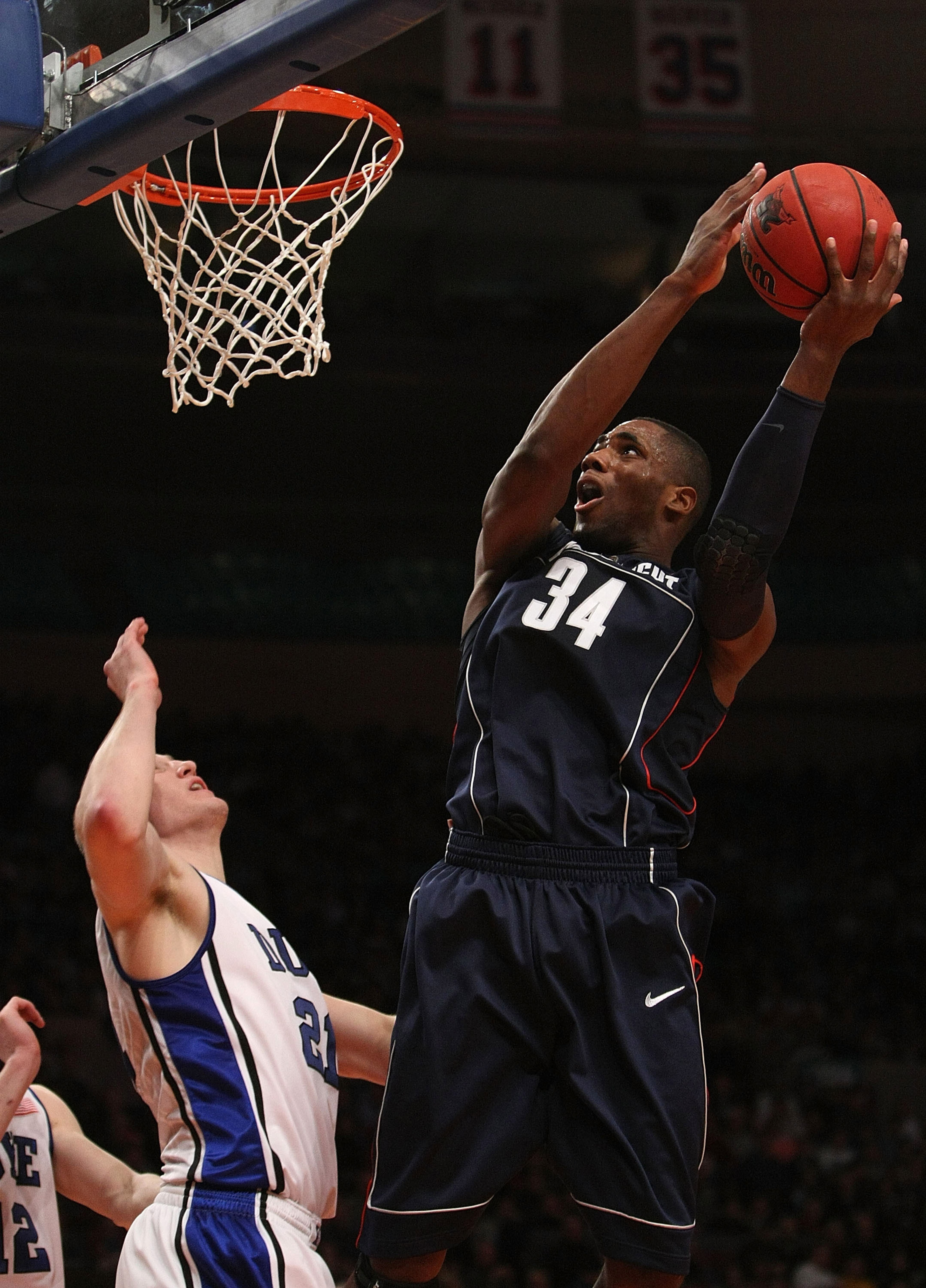 NEW YORK - NOVEMBER 27: Alex Oriakhi #34 of the Connecticut Huskies shoots the ball against the Duke Blue Devils during the Championship game at Madison Square Garden on November 27, 2009 in New York, New York.  (Photo by Nick Laham/Getty Images)