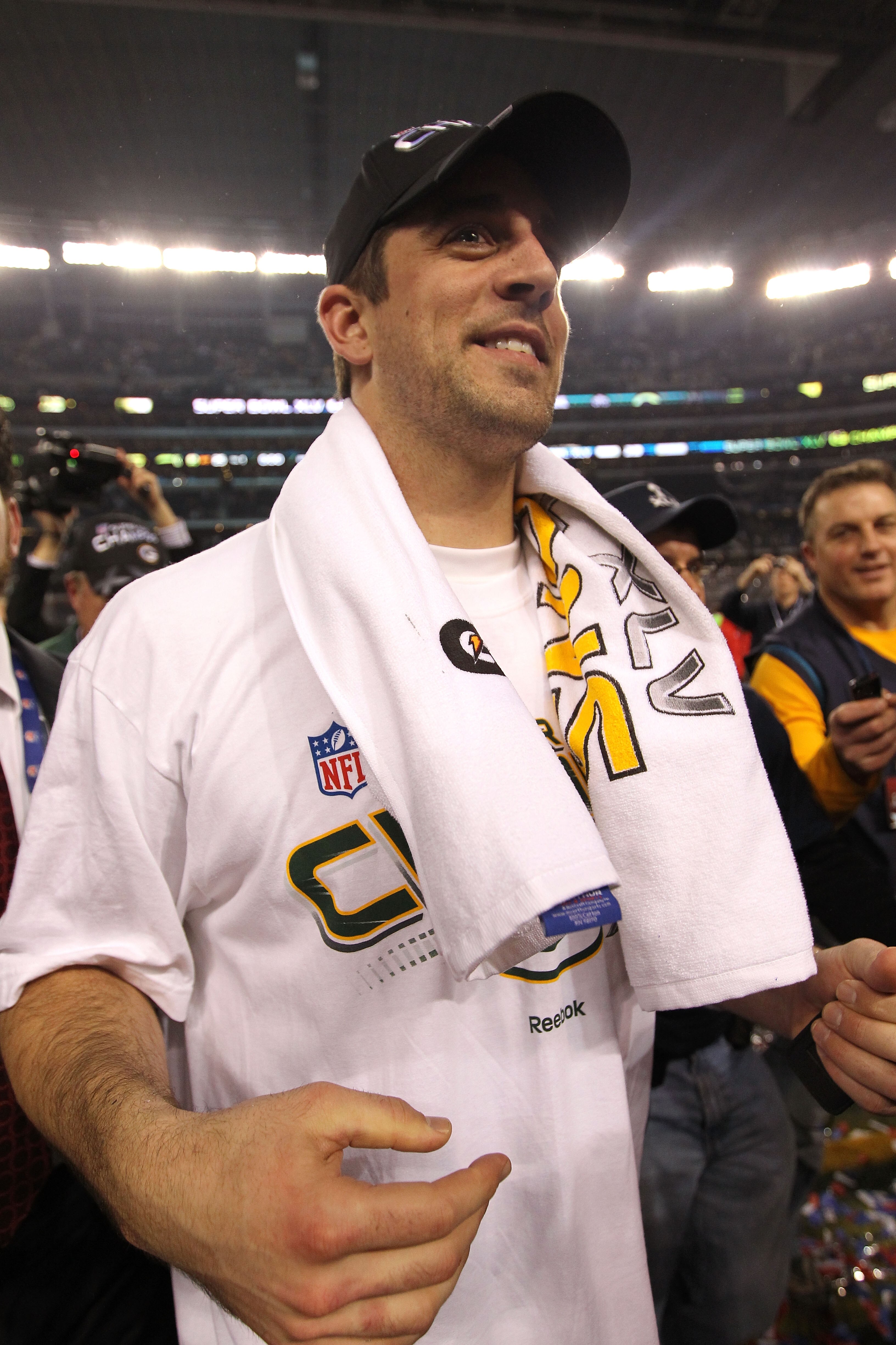 ARLINGTON, TX - FEBRUARY 06:  Super Bowl MVP Aaron Rodgers #12 of the Green Bay Packers celebrates after winning Super Bowl XLV 31-25 against the Pittsburgh Steelers at Cowboys Stadium on February 6, 2011 in Arlington, Texas.  (Photo by Al Bello/Getty Ima