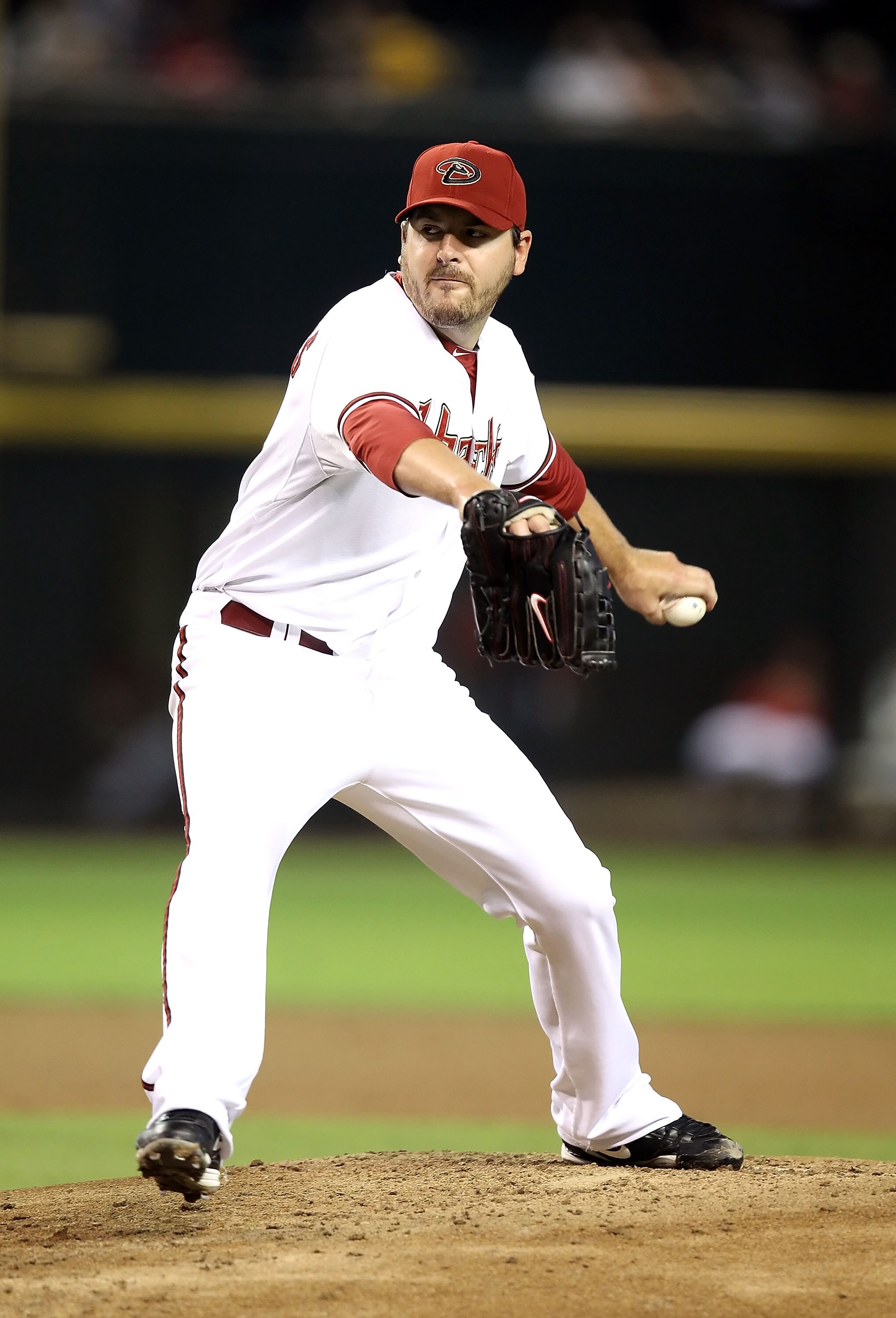 PHOENIX - SEPTEMBER 21:  Starting pitcher Joe Saunders #34 of the Arizona Diamondbacks pitches against the Colorado Rockies during the Major League Baseball game at Chase Field on September 21, 2010 in Phoenix, Arizona.  (Photo by Christian Petersen/Getty