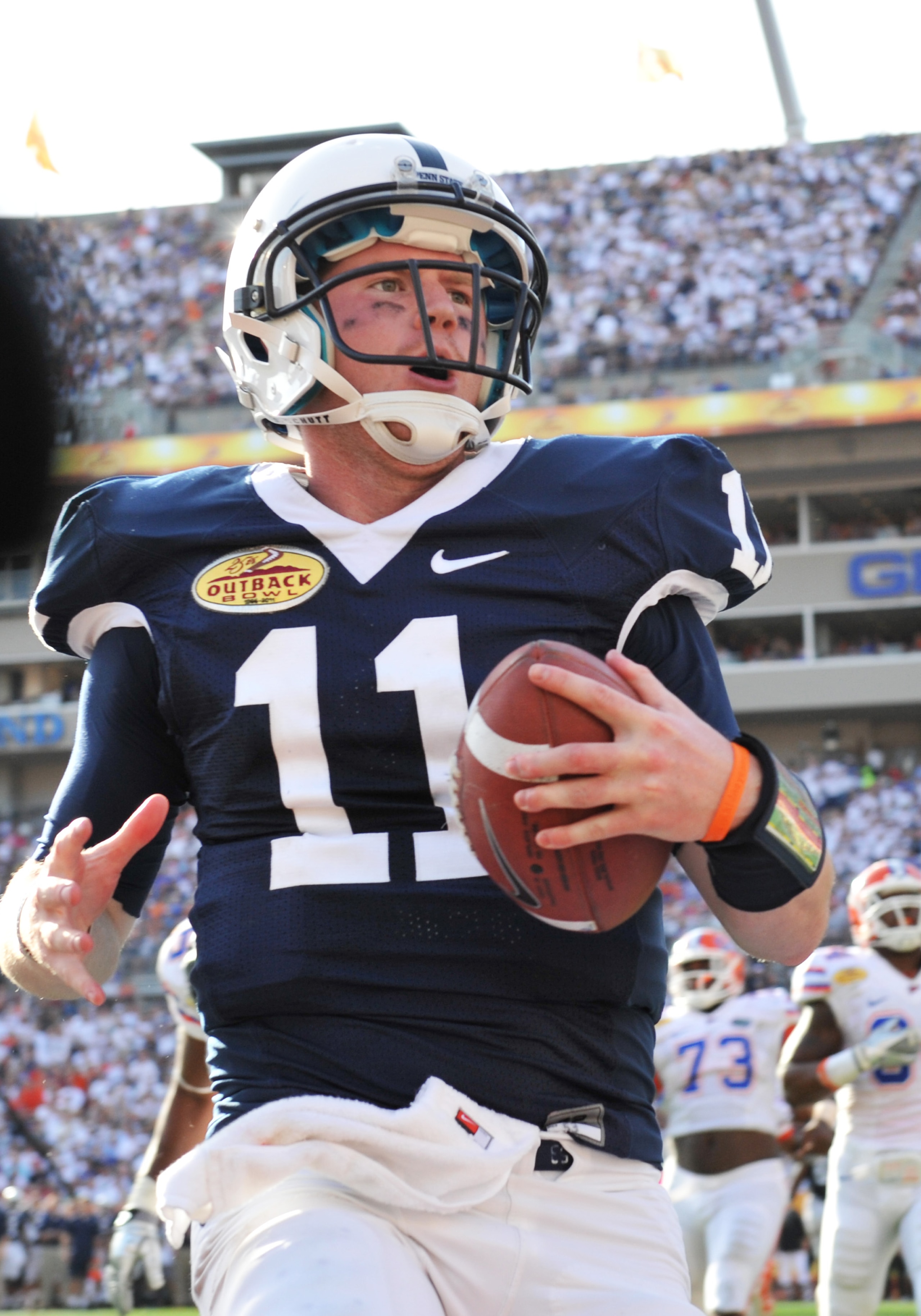 TAMPA, FL - JANUARY 1:  Quarterback Matt McGloin #11 of the Penn State Nittany Lions runs for a touchdown against the Florida Gators January 1, 2011 in the 25th Outback Bowl at Raymond James Stadium in Tampa, Florida.  (Photo by Al Messerschmidt/Getty Ima