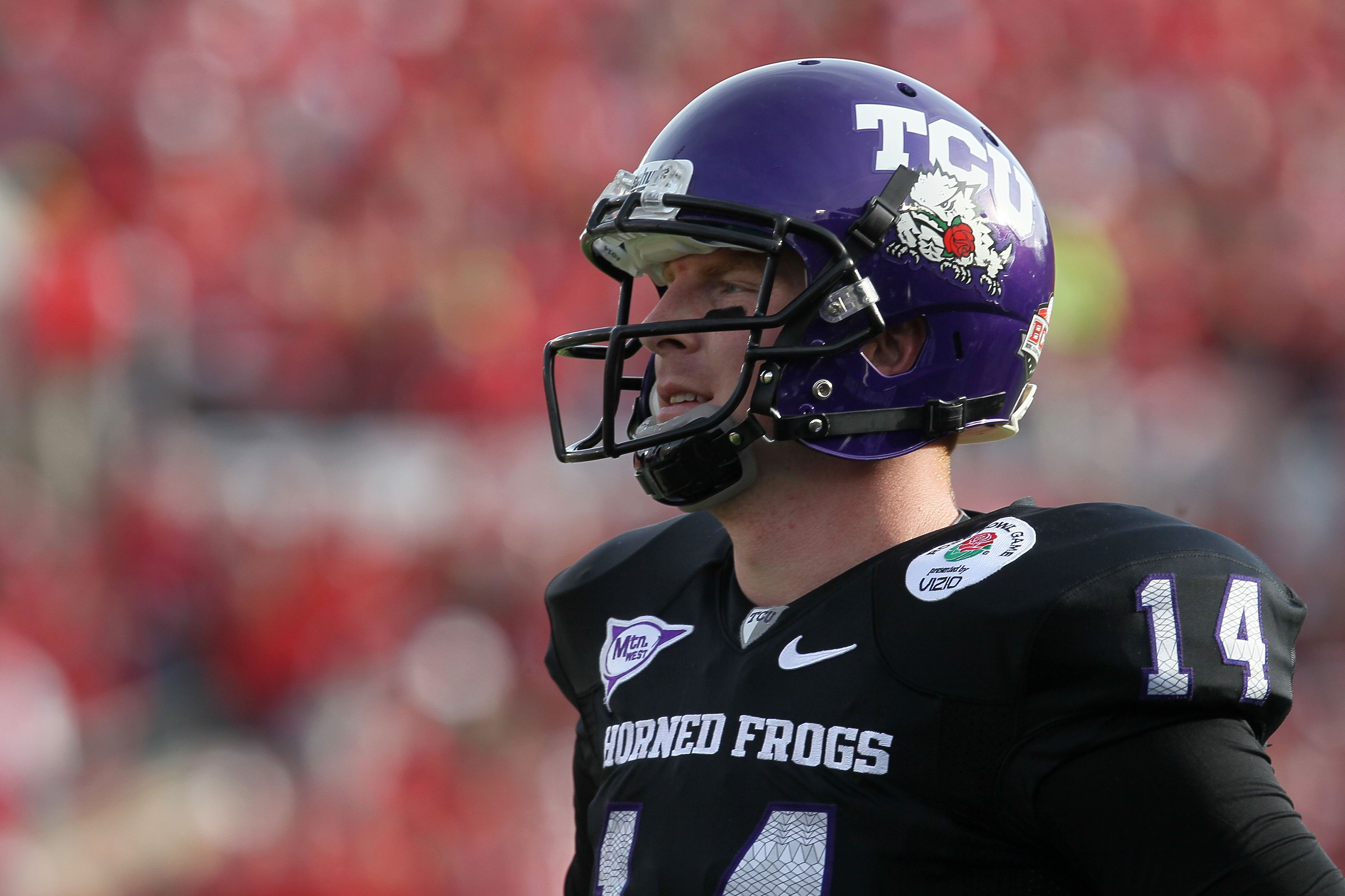 PASADENA, CA - JANUARY 01:  Quarterback Andy Dalton #14 of the TCU Horned Frogs looks on against the Wisconsin Badgers during the 97th Rose Bowl game on January 1, 2011 in Pasadena, California.  (Photo by Stephen Dunn/Getty Images)