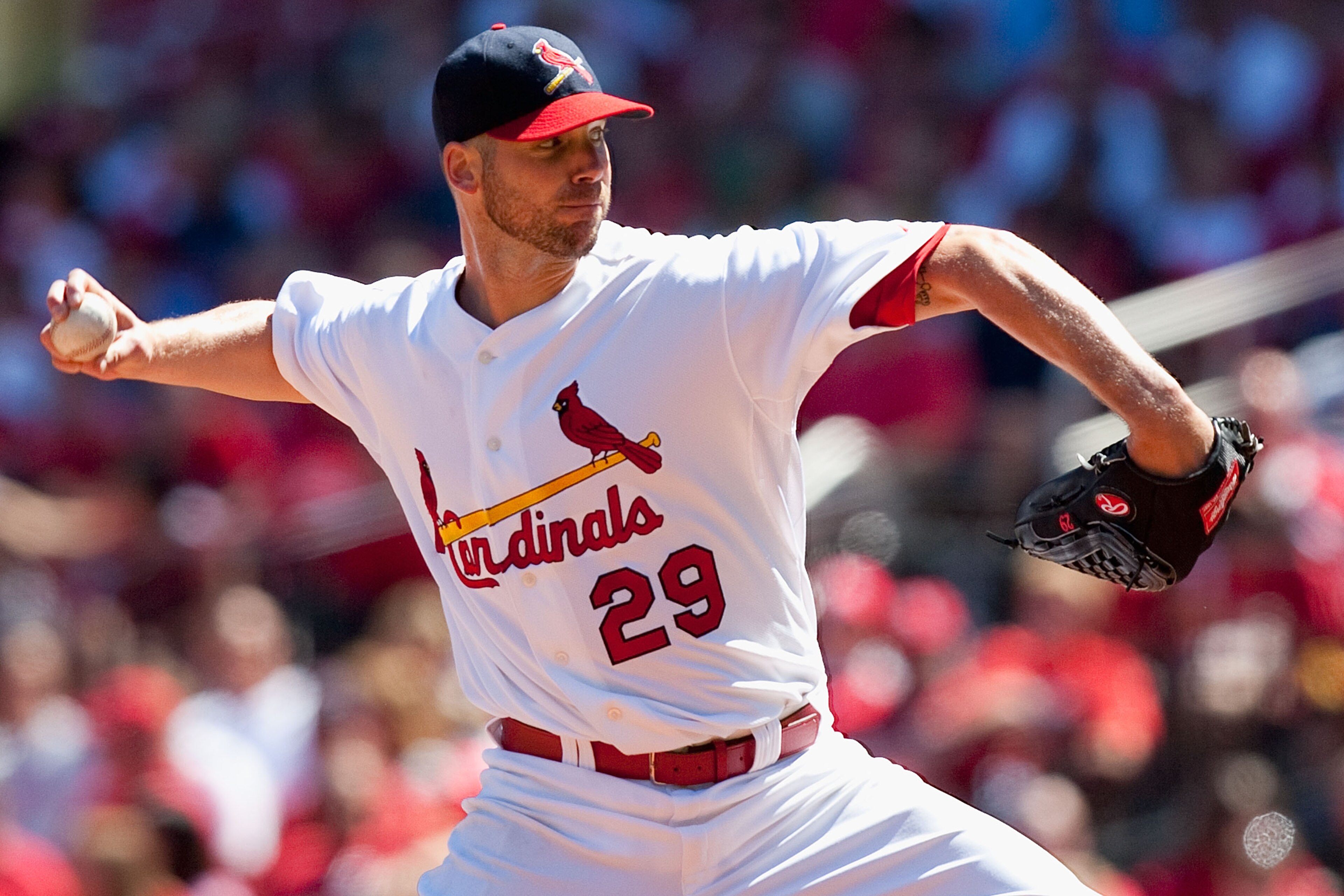 ST. LOUIS - SEPTEMBER 5: Starter Chris Carpenter #29 of the St. Louis Cardinals pitches against the Cincinnati Reds at Busch Stadium on September 5, 2010 in St. Louis, Missouri.  The Cardinals beat the Reds 4-2.  (Photo by Dilip Vishwanat/Getty Images)