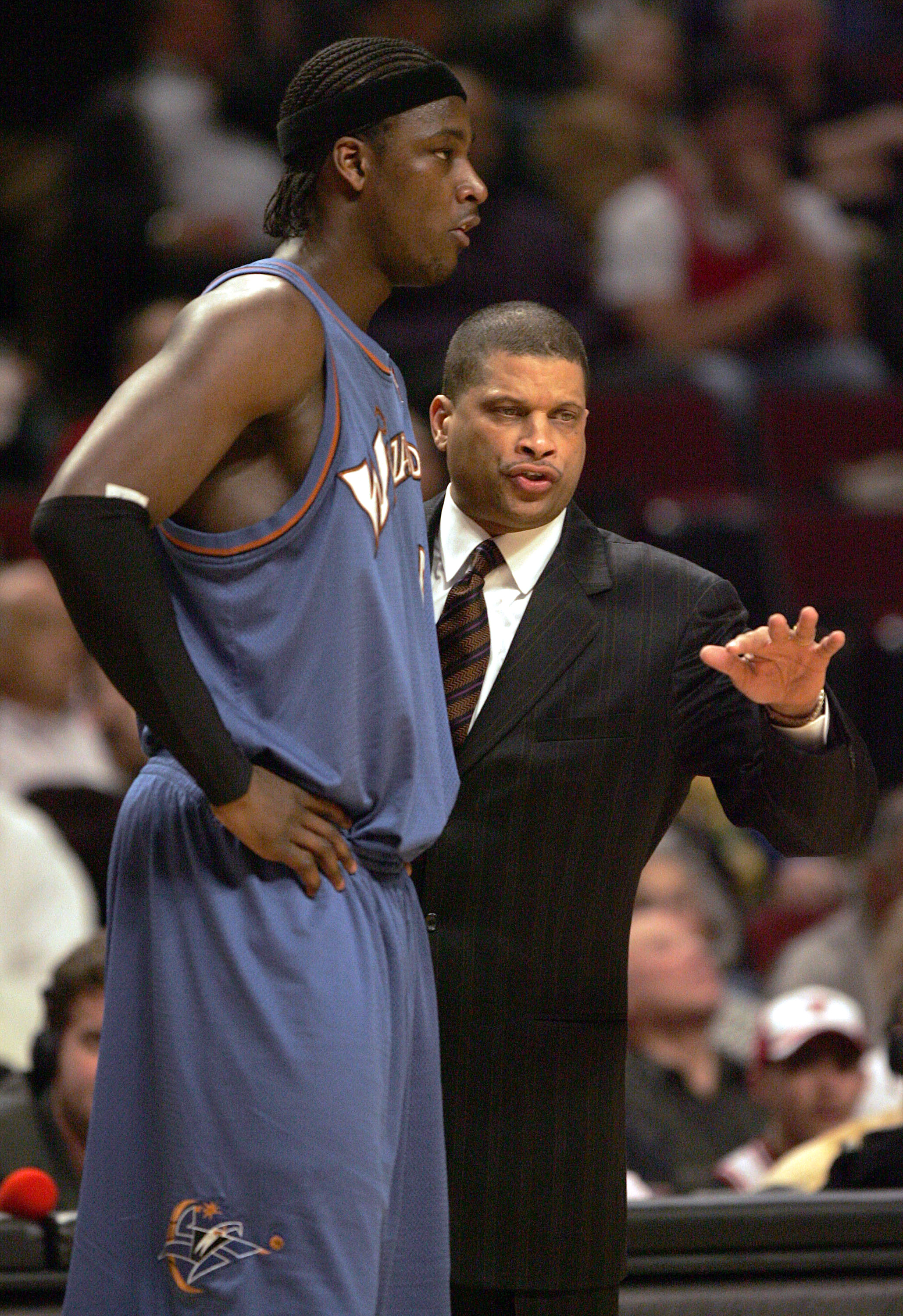 CHICAGO - APRIL 24:  Head coach Eddie Jordan of the Washington Wizards gives instructions to Kwame Brown #5 in Game one of the Eastern Conference Quarterfinals against the Chicago Bulls during the 2005 NBA Playoffs on April 24, 2005 at the United Center i