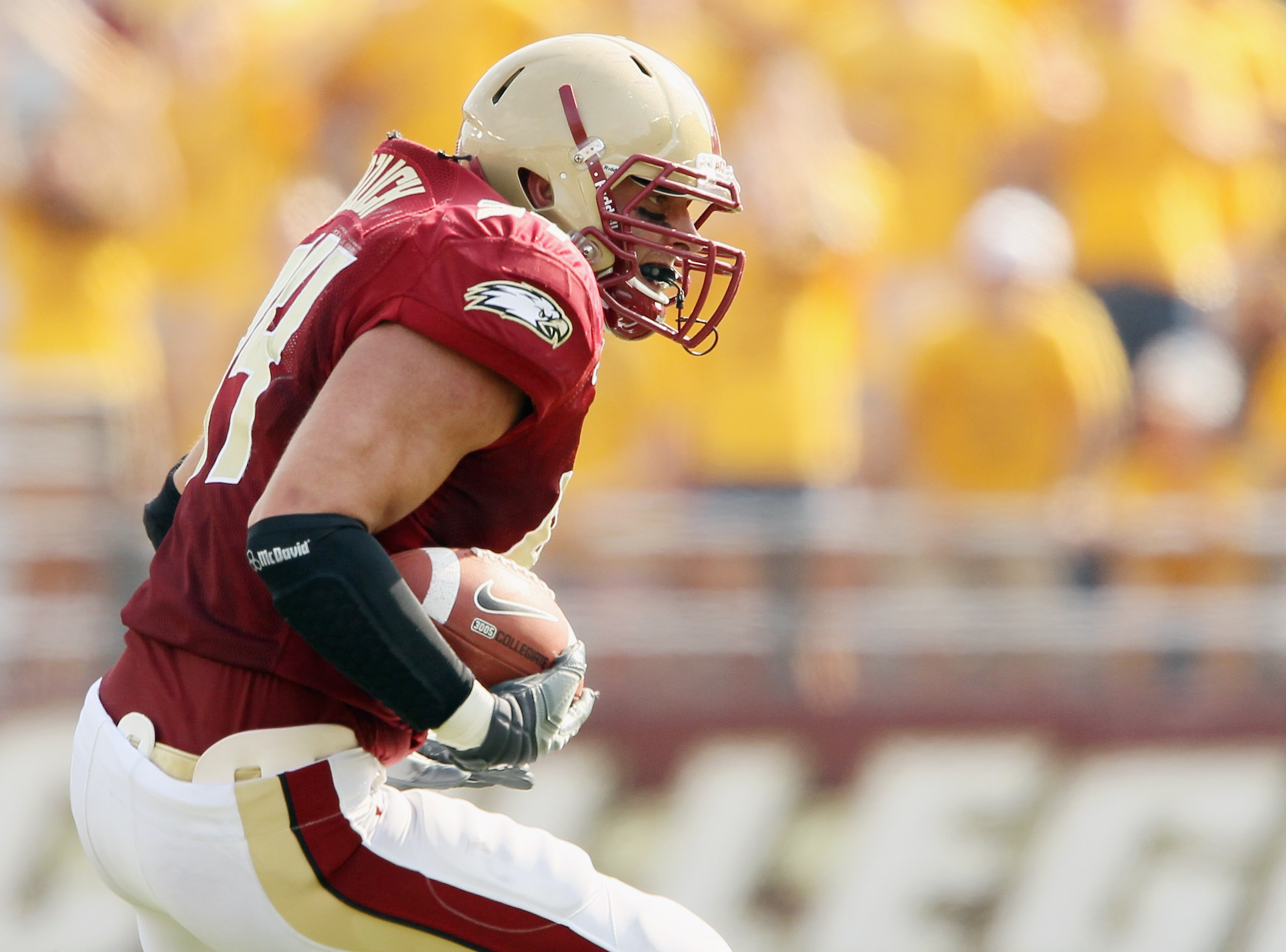 CHESTNUT HILL, MA - SEPTEMBER 25:  Mark Herzlich #94 of the Boston College Eagles carries the ball after he intercepted a pass from Tyrod Taylor of the Virginia Tech Hokies on September 25, 2010 at Alumni Stadium in Chestnut Hill, Massachusetts. Virginia
