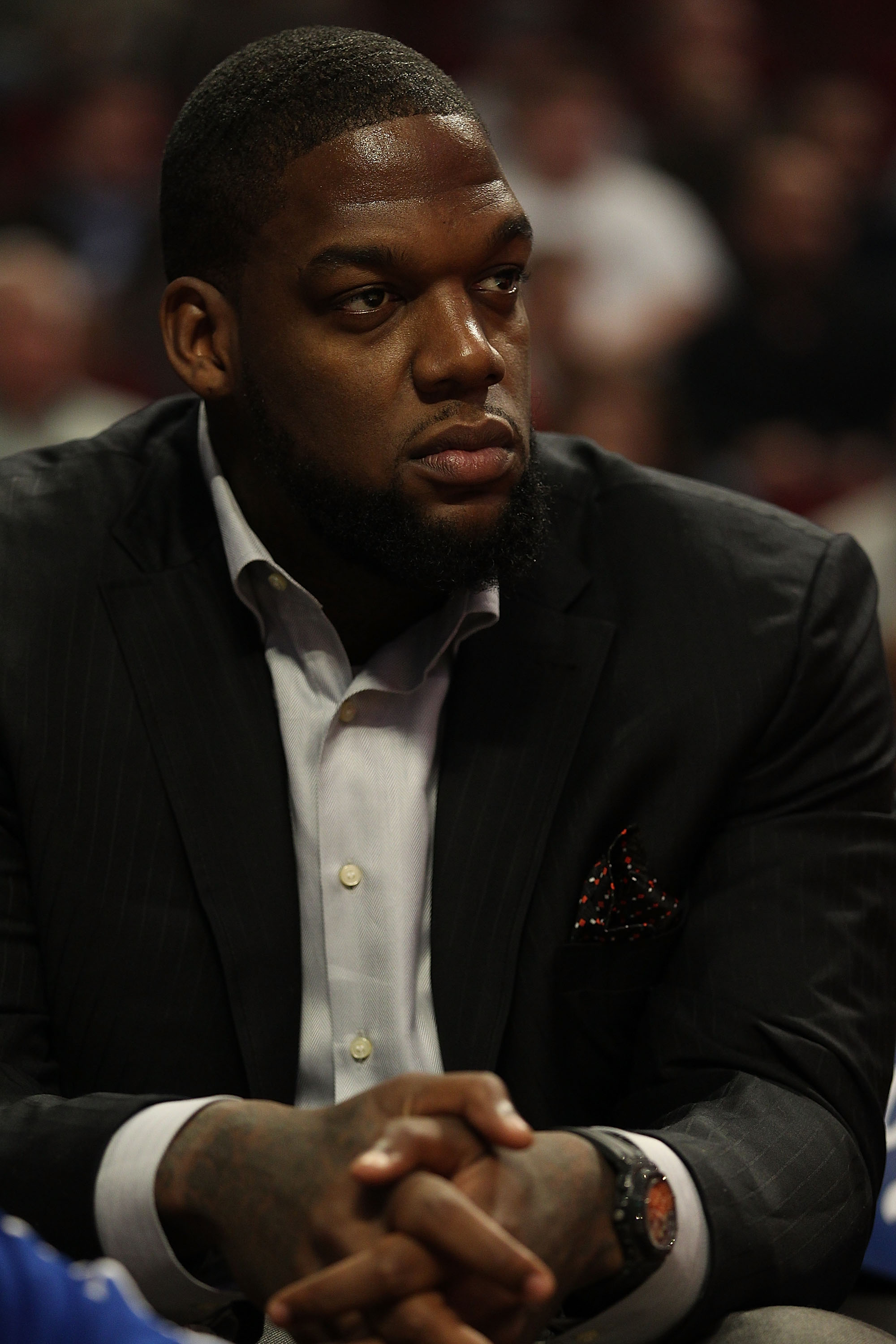 CHICAGO - NOVEMBER 04: Eddy Curry of the New York Knicks sits on the bench and watches his teammates take on the Chicago Bulls at the United Center on November 4, 2010 in Chicago, Illinois. NOTE TO USER: User expressly acknowledges and agrees that, by dow