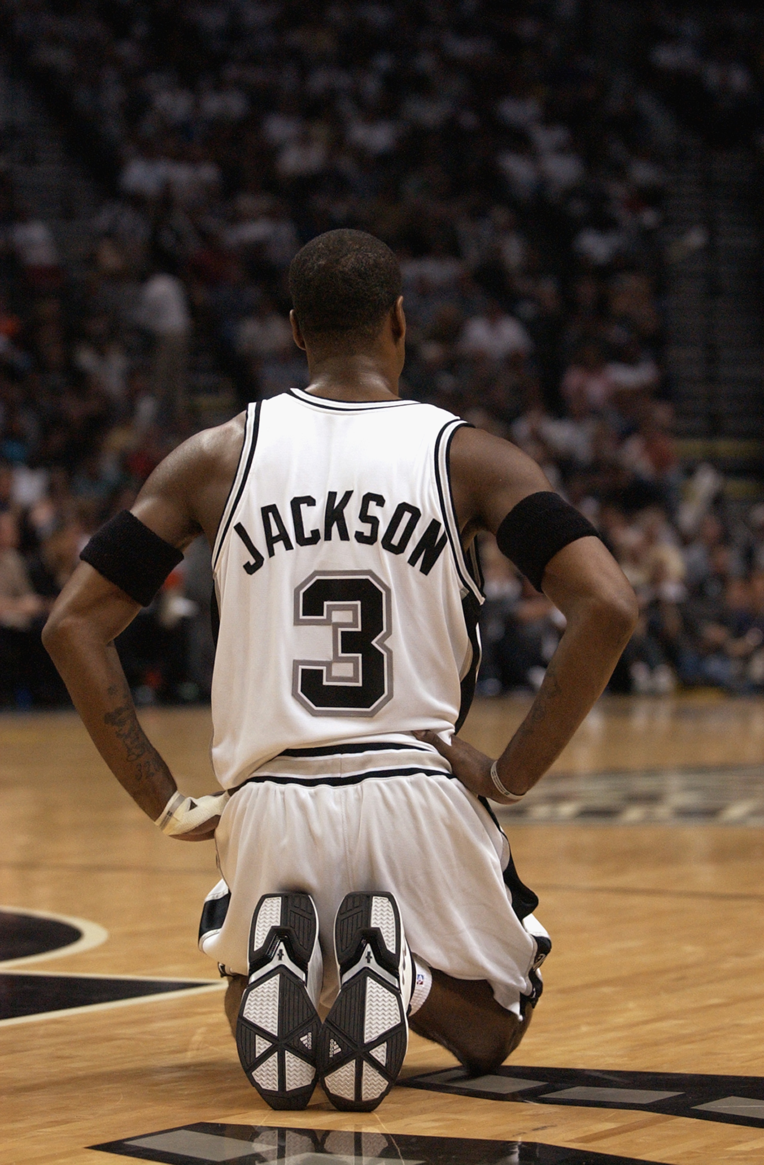 SAN ANTONIO - JUNE 6:  Stephen Jackson #3 of the San Antonio Spurs rests during Game two of the 2003 NBA Finals against the New Jersey Nets at SBC Center on June 6, 2003 in San Antonio, Texas.  The Nets won 87-85.  NOTE TO USER: User expressly acknowledge