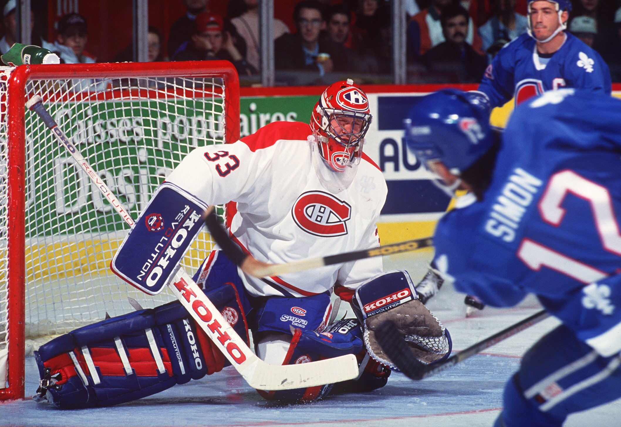1994:  GOALTENDER PATRICK ROY OF THE MONTREAL CANADIENS MAKES A SAVE AGAINST THE QUEBEC NORDIQUES AT THE FORUM IN MONTREAL, QUEBEC. Mandatory Credit: Robert Laberge/ALLSPORT