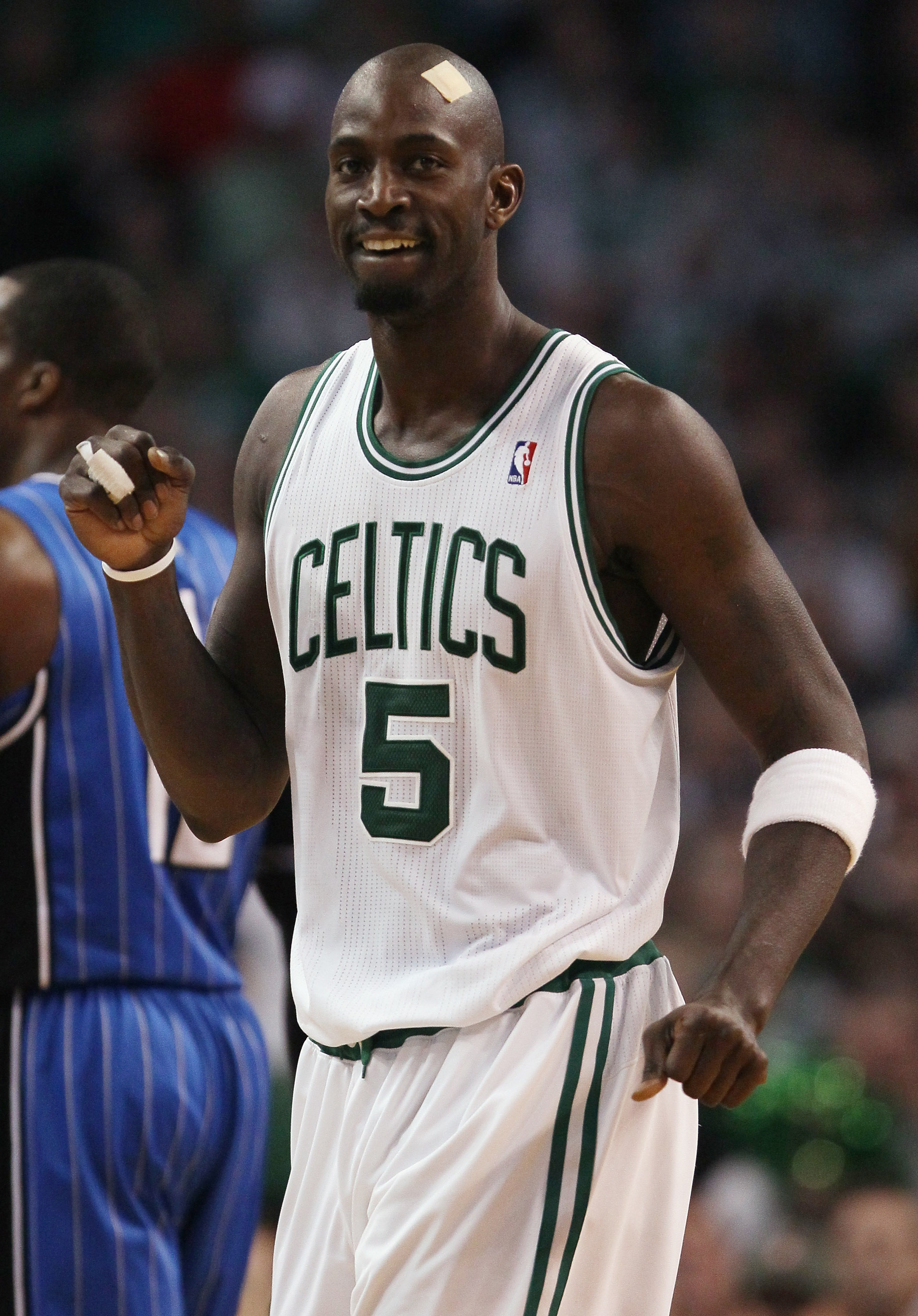 BOSTON, MA - FEBRUARY 06:  Kevin Garnett #5 of the Boston Celtics celebrates in the first half against the Orlando Magic on February 6, 2011 at the TD Garden in Boston, Massachusetts. The Celtics defeated the Magic 91-80. NOTE TO USER: User expressly ackn