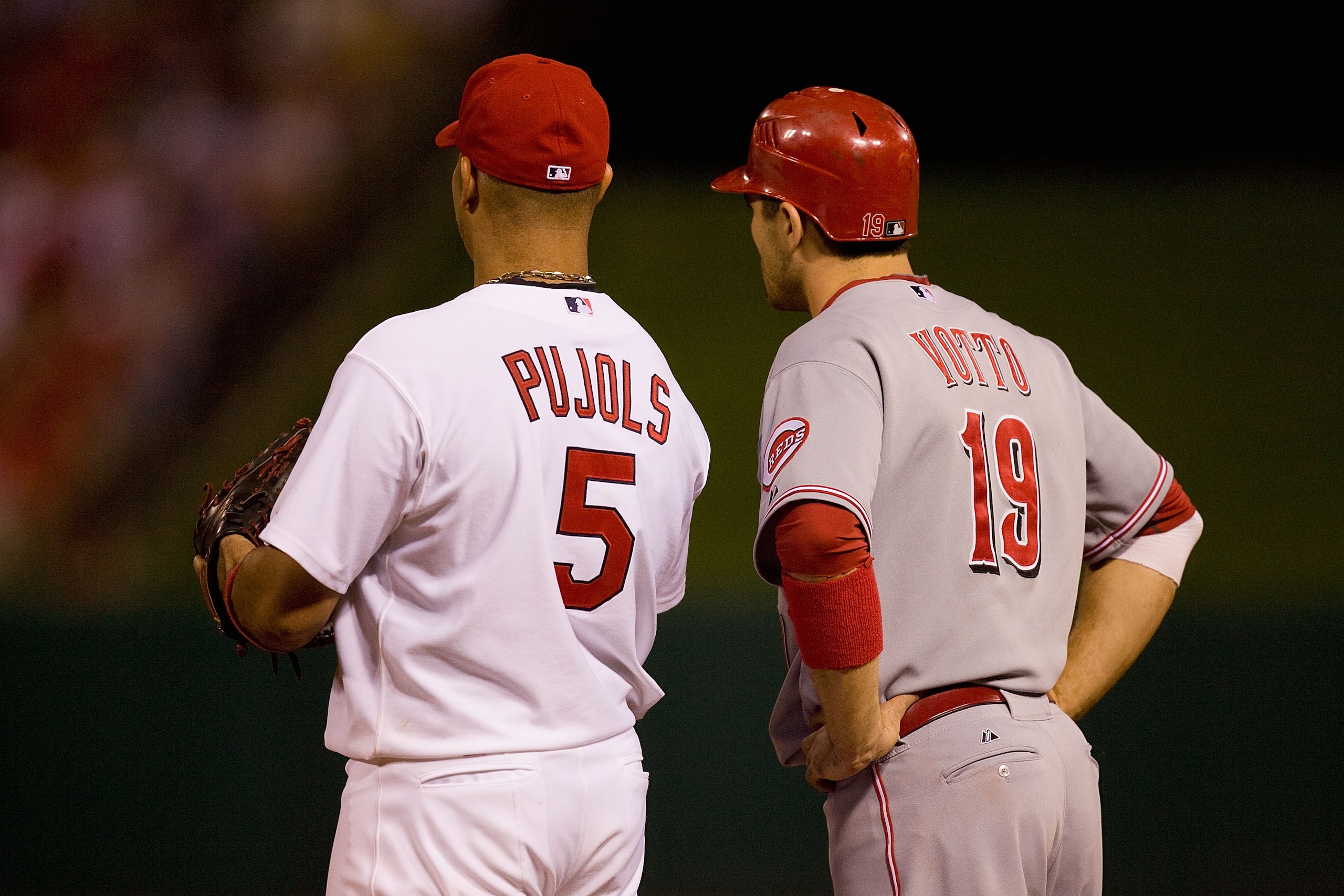ST. LOUIS - SEPTEMBER 3: Albert Pujols #5 of the St. Louis Cardinals and Joey Votto #19 of the Cincinnati Reds stand on first base at Busch Stadium on September 3, 2010 in St. Louis, Missouri. The Cardinals beat the Reds 3-2. (Photo by Dilip Vishwanat/G ST. LOUIS - SEPTEMBER 3: Albert Pujols #5 of the St. Louis Cardinals and Joey Votto #19 of the Cincinnati Reds stand on first base at Busch Stadium on September 3, 2010 in St. Louis, Missouri. The Cardinals beat the Reds 3-2. (Photo by Dilip Vishwanat/G