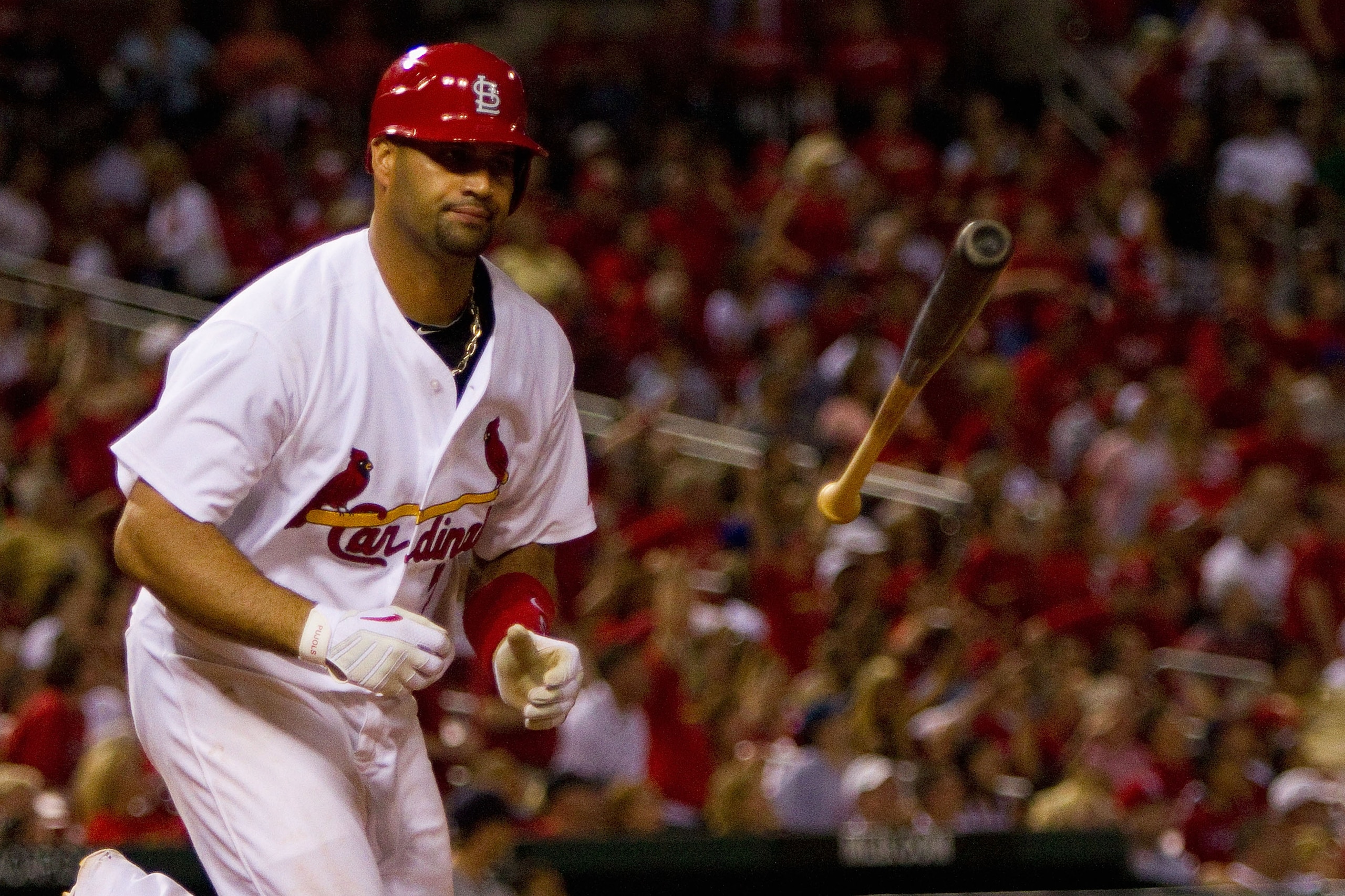 ST. LOUIS - JUNE 16: Albert Pujols #5 of the St. Louis Cardinals reacts to popping out against the Seattle Mariners at Busch Stadium on June 16, 2010 in St. Louis, Missouri. (Photo by Dilip Vishwanat/Getty Images) ST. LOUIS - JUNE 16: Albert Pujols #5 of the St. Louis Cardinals reacts to popping out against the Seattle Mariners at Busch Stadium on June 16, 2010 in St. Louis, Missouri. (Photo by Dilip Vishwanat/Getty Images)