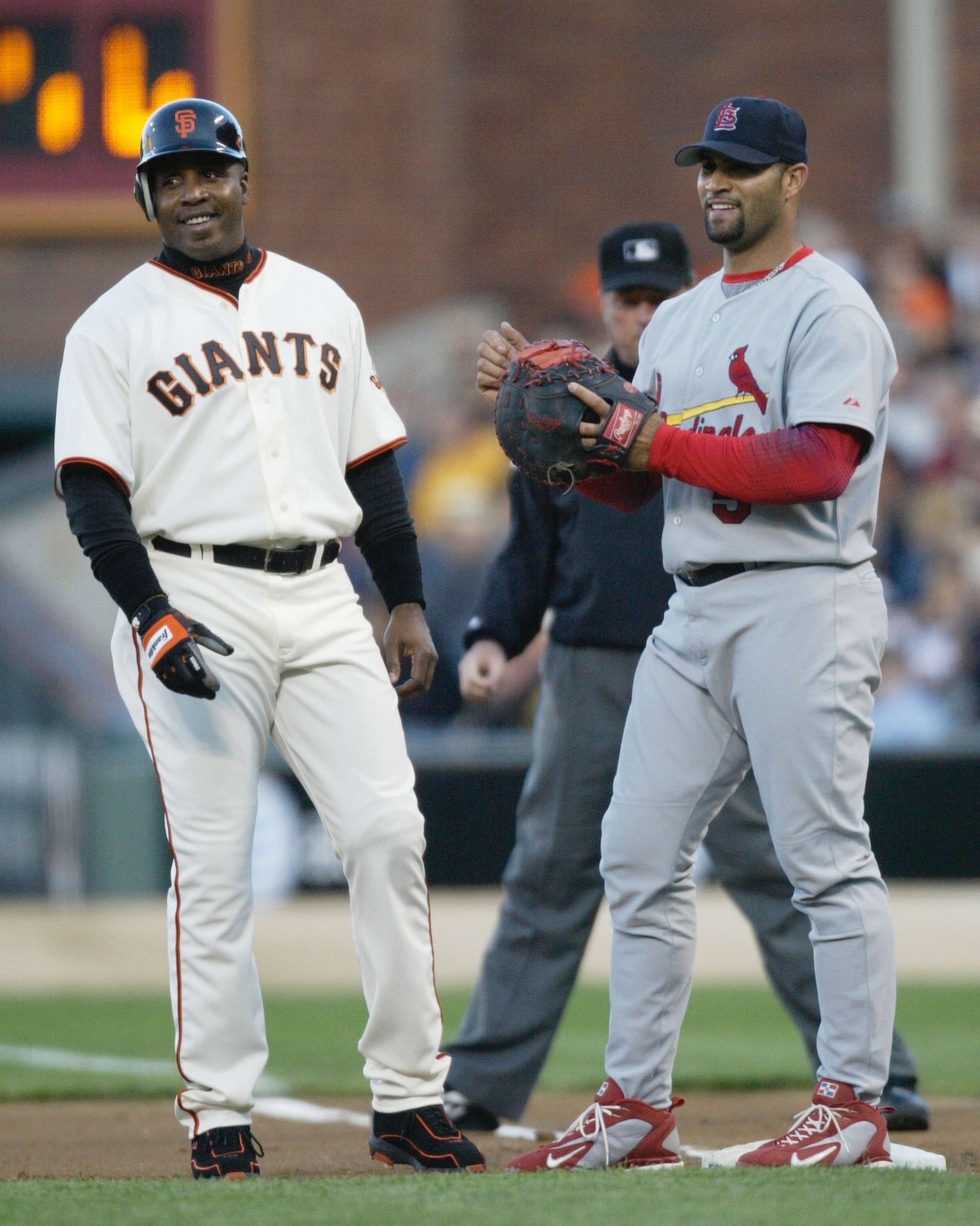 SAN FRANCISCO - MAY 23: Barry Bonds #25 of the San Francisco Giants talks with Albert Pujols #5 of the St. Louis Cardinals during the game May 23, 2006 at AT&T Park in San Francisco, California. (Photo by Otto Greule Jr/Getty Images) SAN FRANCISCO - MAY 23: Barry Bonds #25 of the San Francisco Giants talks with Albert Pujols #5 of the St. Louis Cardinals during the game May 23, 2006 at AT&T Park in San Francisco, California. (Photo by Otto Greule Jr/Getty Images)