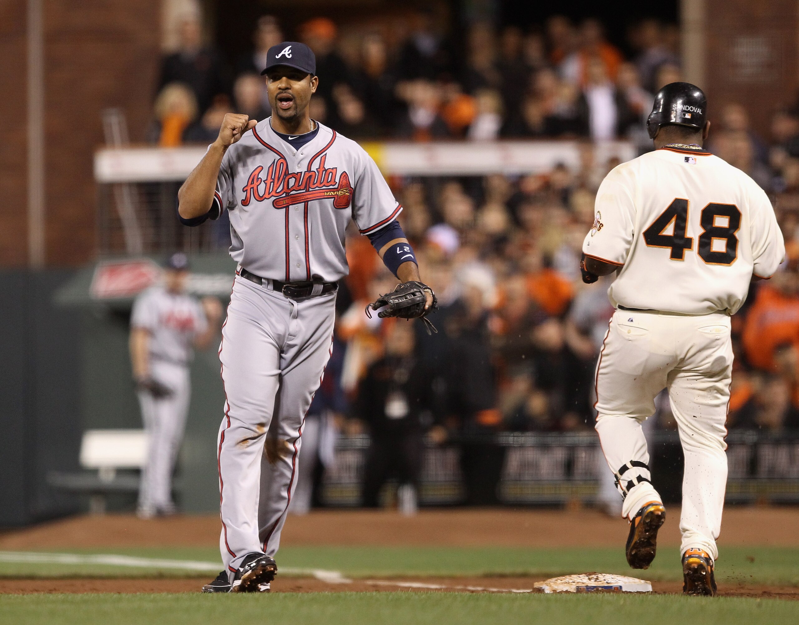 SAN FRANCISCO - OCTOBER 07: Derrek Lee #27 of the Atlanta Braves pumps his fist after Pablo Sandoval #48 of the San Francisco Giants grounded in to a double play to end the sixth inning during game 1 of the NLDS at AT&T Park on October 7, 2010 in San Fra SAN FRANCISCO - OCTOBER 07: Derrek Lee #27 of the Atlanta Braves pumps his fist after Pablo Sandoval #48 of the San Francisco Giants grounded in to a double play to end the sixth inning during game 1 of the NLDS at AT&T Park on October 7, 2010 in San Fra