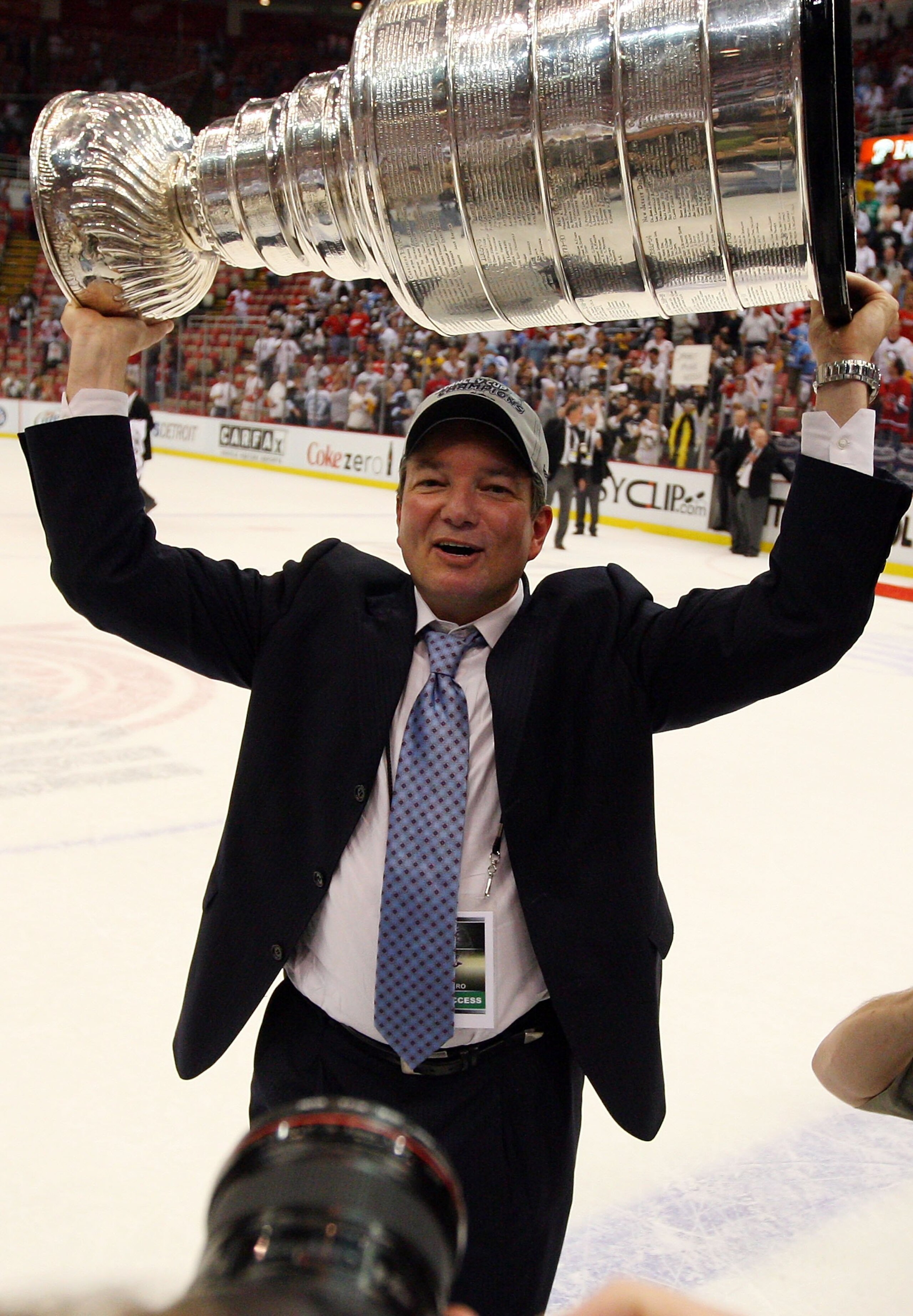 DETROIT - JUNE 12: General manager Ray Shero of the Pittsburgh Penguins celebrates with the Stanley Cup after defeating the Detroit Red Wings by a score of 2-1 to win Game Seven and the 2009 NHL Stanley Cup Finals at Joe Louis Arena on June 12, 2009 in D DETROIT - JUNE 12: General manager Ray Shero of the Pittsburgh Penguins celebrates with the Stanley Cup after defeating the Detroit Red Wings by a score of 2-1 to win Game Seven and the 2009 NHL Stanley Cup Finals at Joe Louis Arena on June 12, 2009 in D