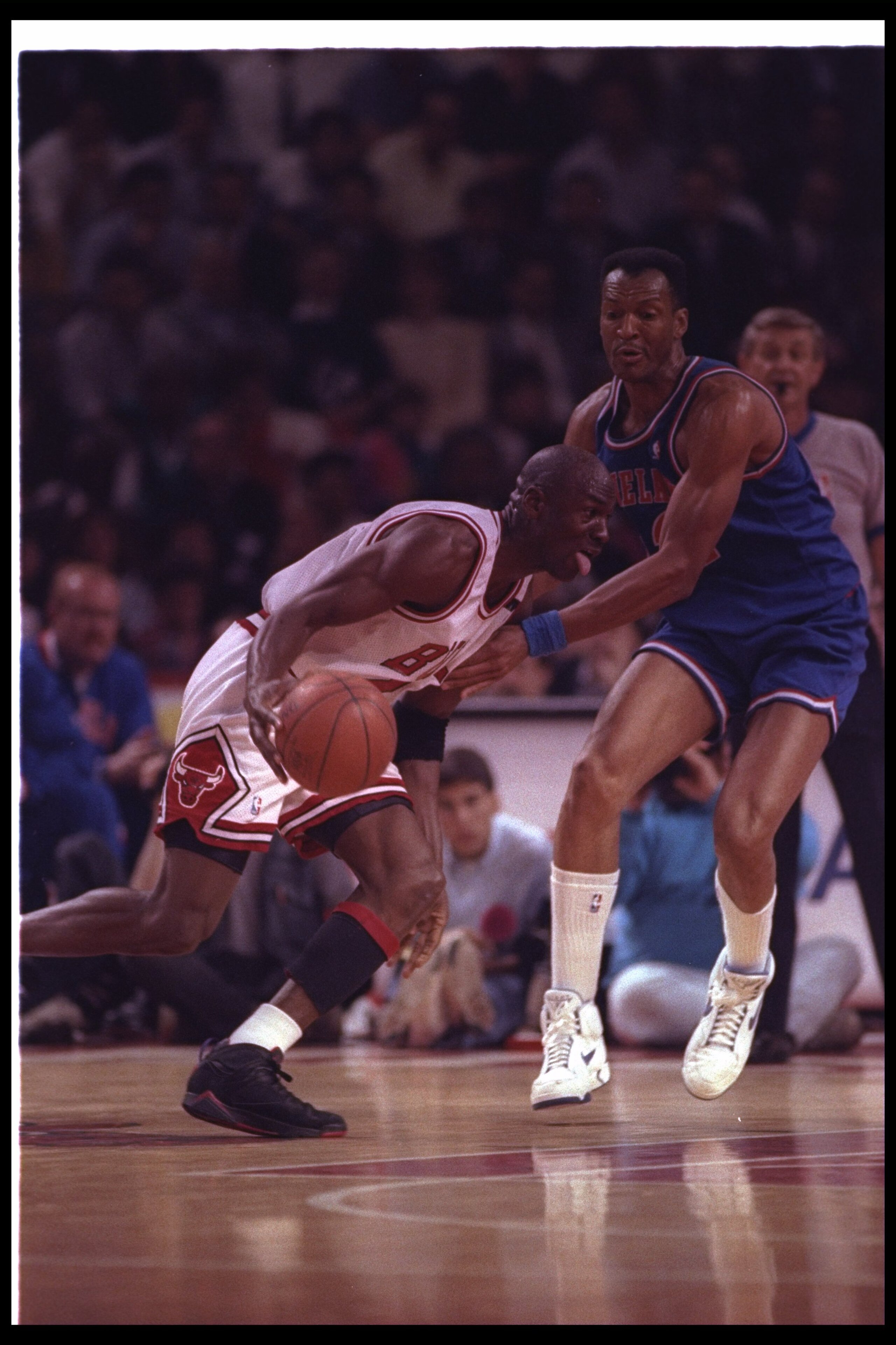 19 May 1992:  Guard Michael Jordan of the Chicago Bulls (left) moves the ball during a game against the Cleveland Cavaliers at the United Center in Chicago, Illinois. Mandatory Credit: Jonathan Daniel  /Allsport
