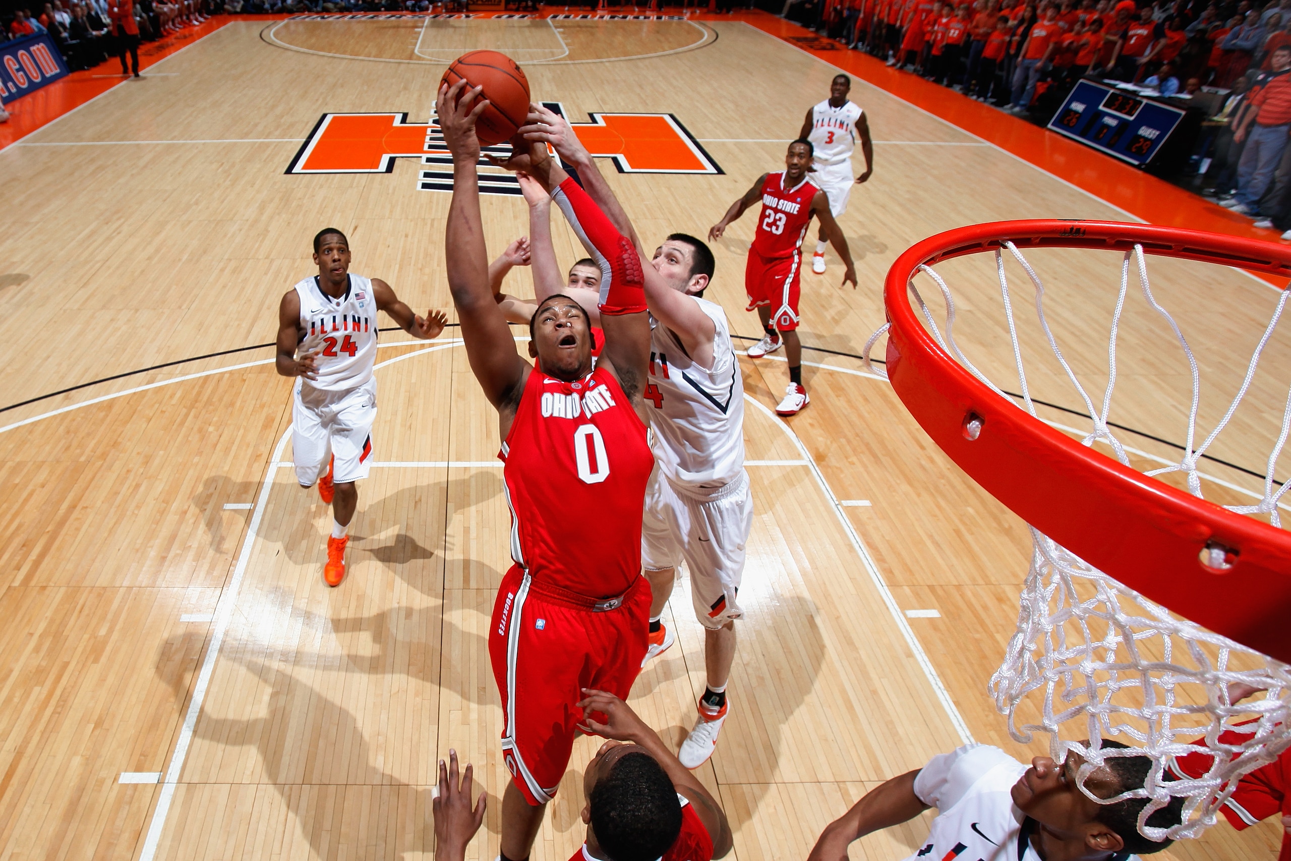 CHAMPAIGN, IL - JANUARY 22: Jared Sullinger #0 of the Ohio State Buckeyes pulls down one of his game-high 16 rebounds against the Illinois Fighting Illini at Assembly Hall on January 22, 2011 in Champaign, Illinois. Ohio State won 73-68. (Photo by Joe Rob