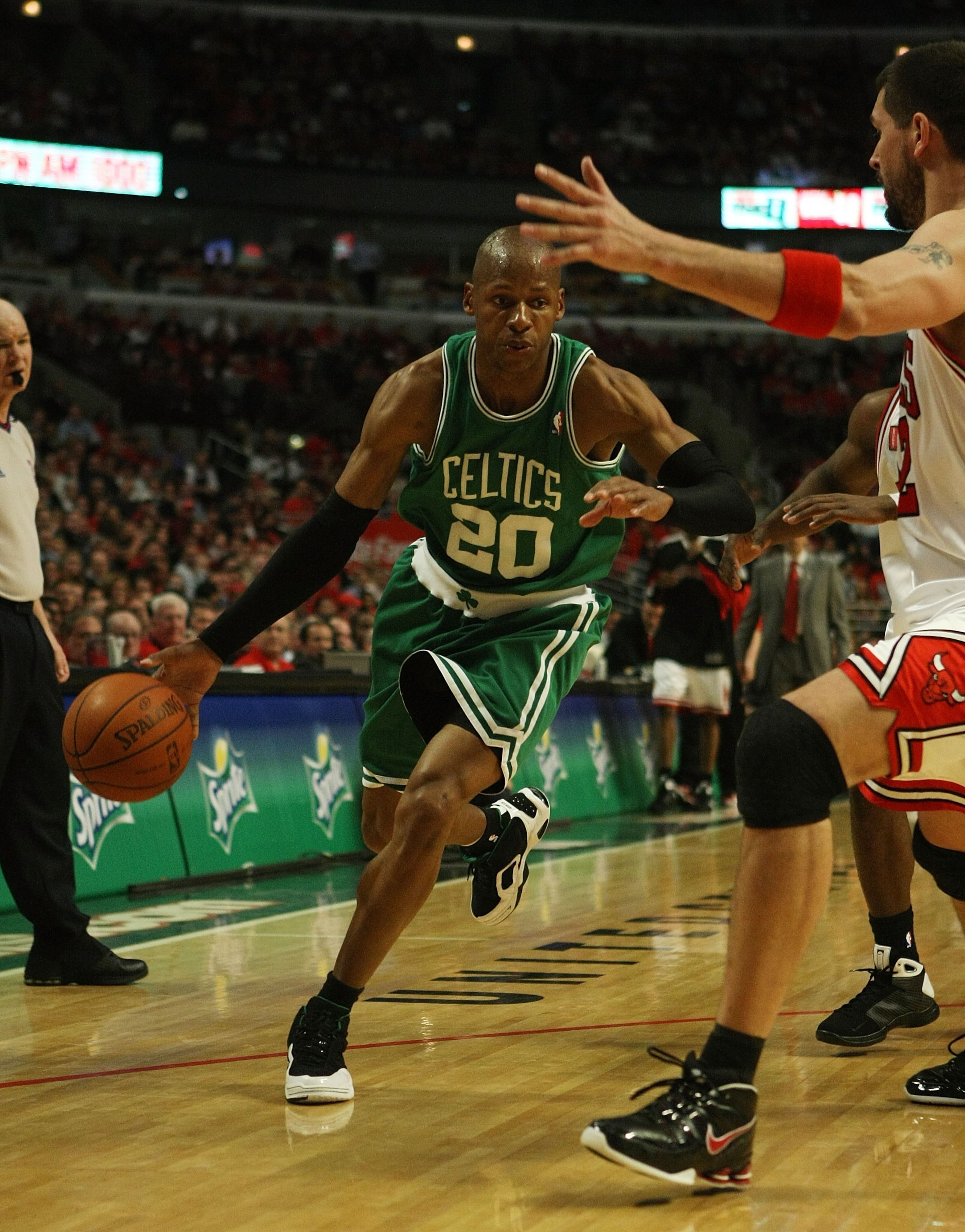 CHICAGO - APRIL 30: Ray Allen #20 of the Boston Celtics drives against Brad Miller #52 of the Chicago Bulls in Game Six of the Eastern Conference Quarterfinals during the 2009 NBA Playoffs at the United Center on April 30, 2009 in Chicago, Illinois. The B