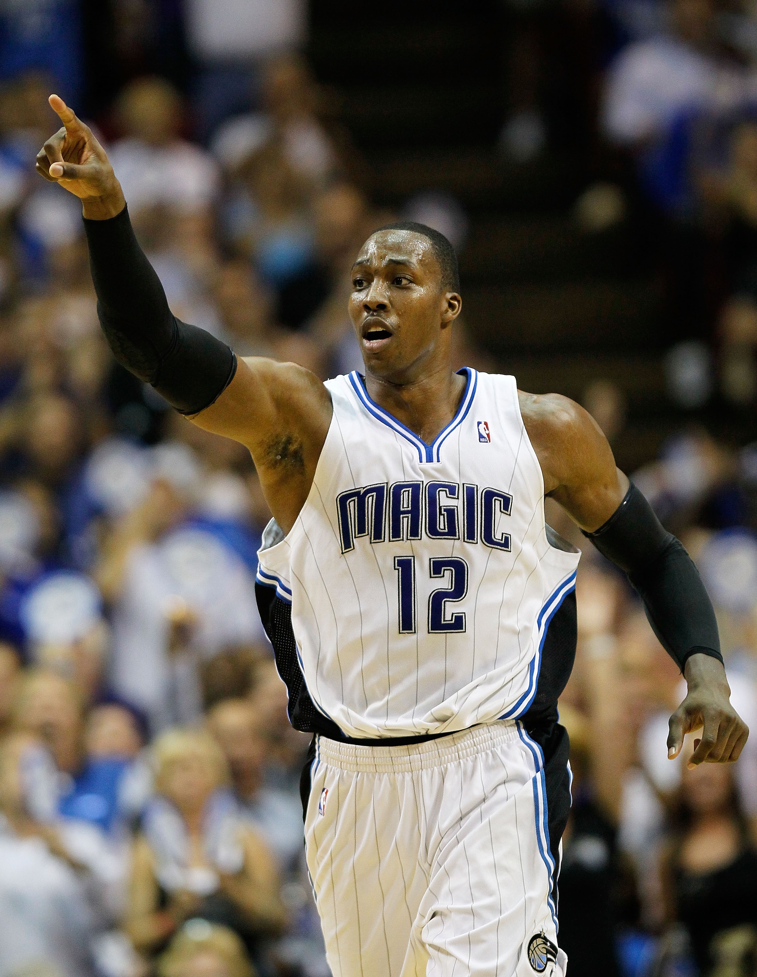 ORLANDO, FL - MAY 26:  Dwight Howard #12 of the Orlando Magic reacts against the Boston Celtics in Game Five of the Eastern Conference Finals during the 2010 NBA Playoffs at Amway Arena on May 26, 2010 in Orlando, Florida.  NOTE TO USER: User expressly ac
