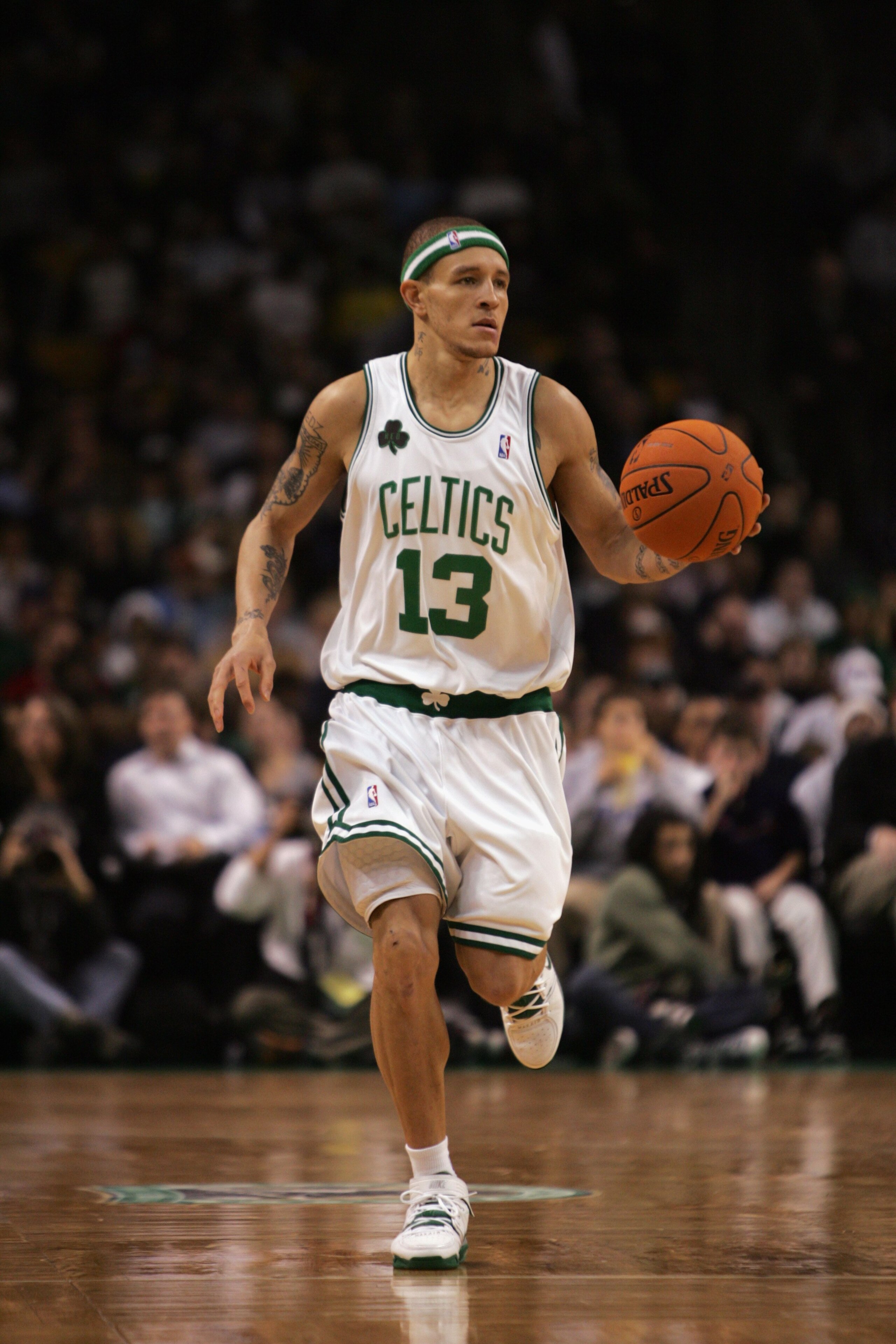 BOSTON - DECEMBER 08:  Delonte West #13 of the Boston Celtics brings the ball upcourt against the Phoenix Suns during the game on December 8, 2006 at the TD Banknorth Garden in Boston, Massachusetts.  The Suns won 116-111. NOTE TO USER: User expressly ack