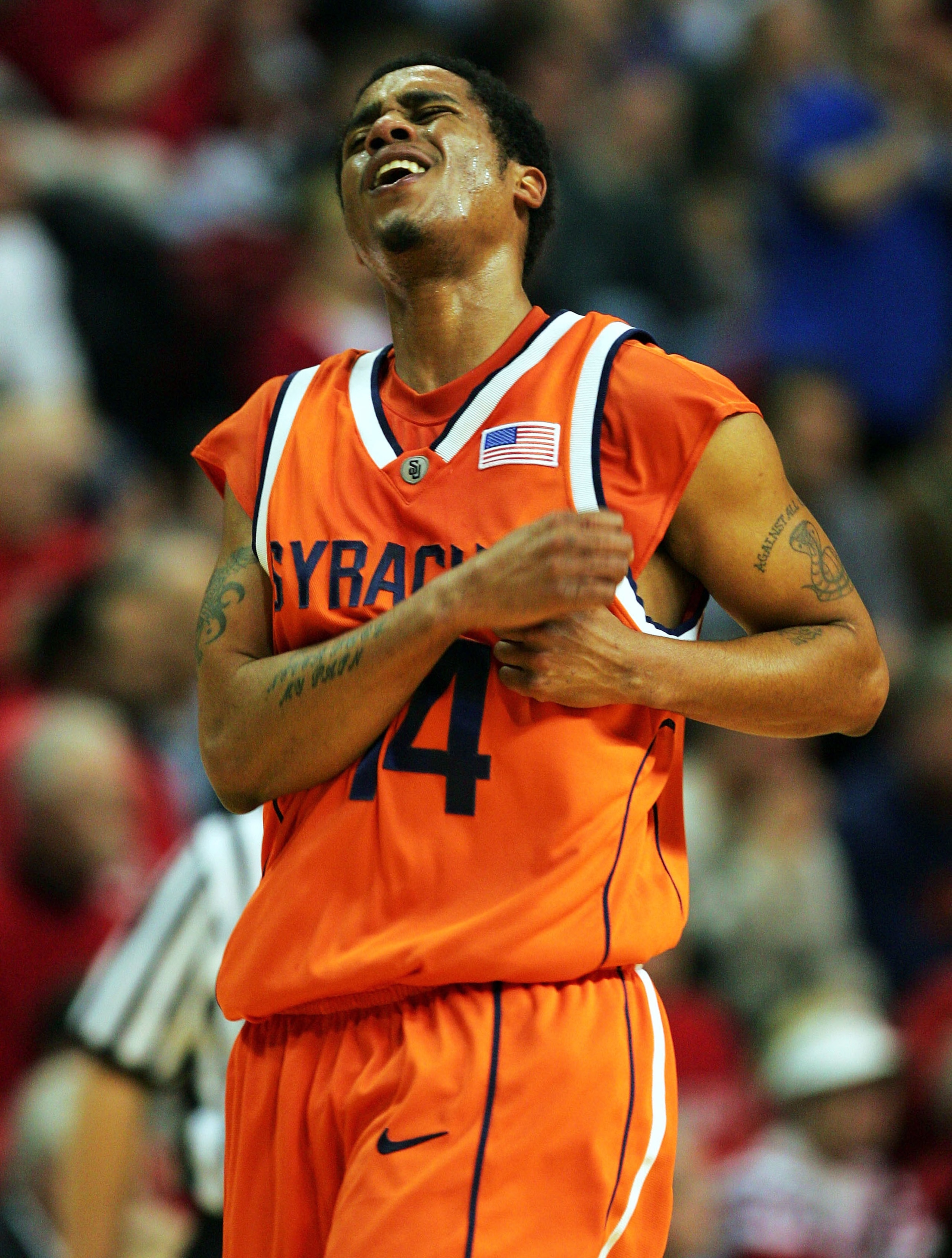 PISCATAWAY, NJ - JANUARY 24:  Billy Edelin #14 of the Syracuse Orangemen shows his emotion after being called for his third foul against the Rutgers Scarlet Knights January 24, 2005 at the RAC in Piscataway, New Jersey.  (Photo by Ezra Shaw/Getty Images)