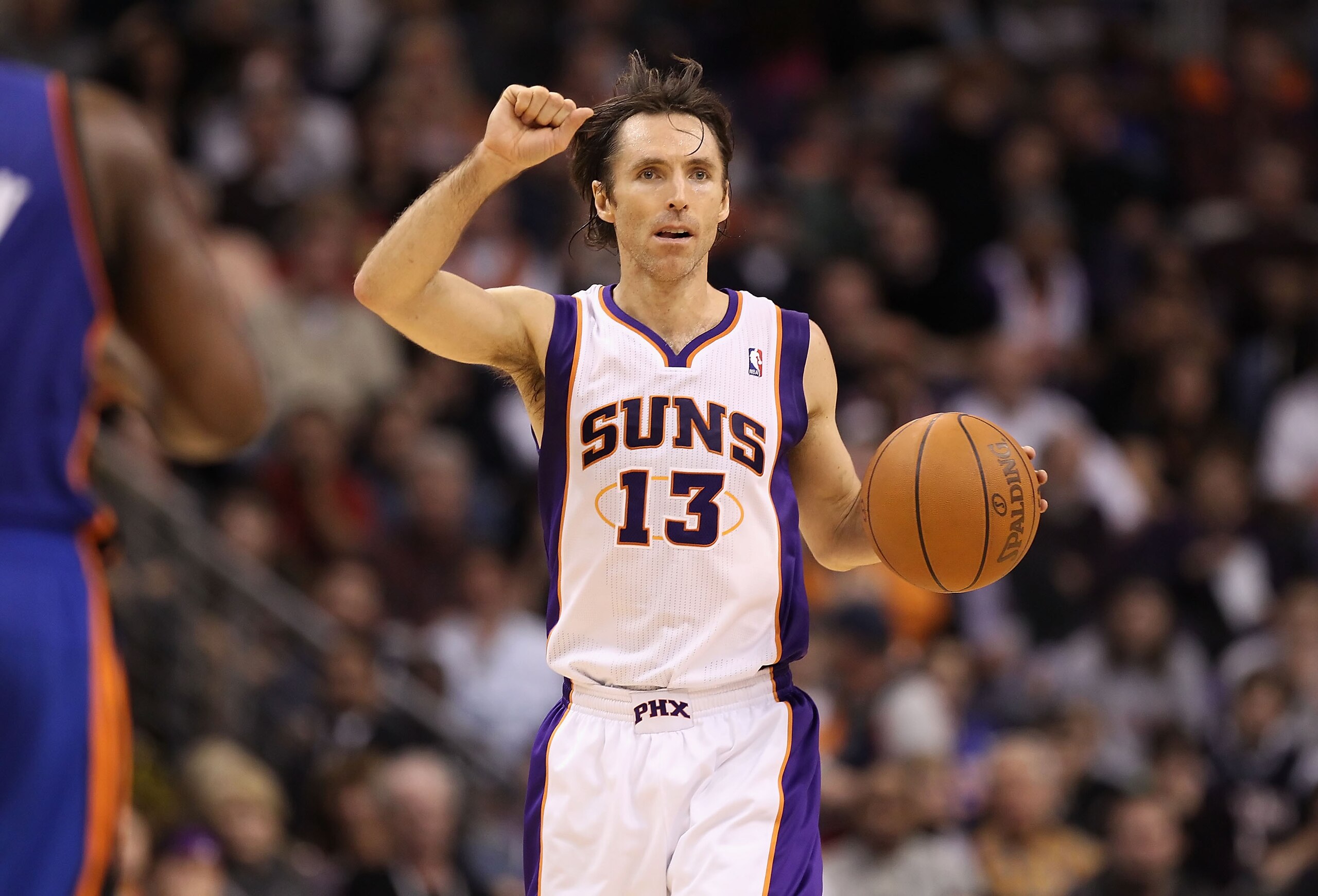 PHOENIX, AZ - JANUARY 07: Steve Nash #13 of the Phoenix Suns handles the ball during the NBA game against the New York Knicks at US Airways Center on January 7, 2011 in Phoenix, Arizona. The Knicks defeated the Suns 121-96. NOTE TO USER: User expressly PHOENIX, AZ - JANUARY 07: Steve Nash #13 of the Phoenix Suns handles the ball during the NBA game against the New York Knicks at US Airways Center on January 7, 2011 in Phoenix, Arizona. The Knicks defeated the Suns 121-96. NOTE TO USER: User expressly