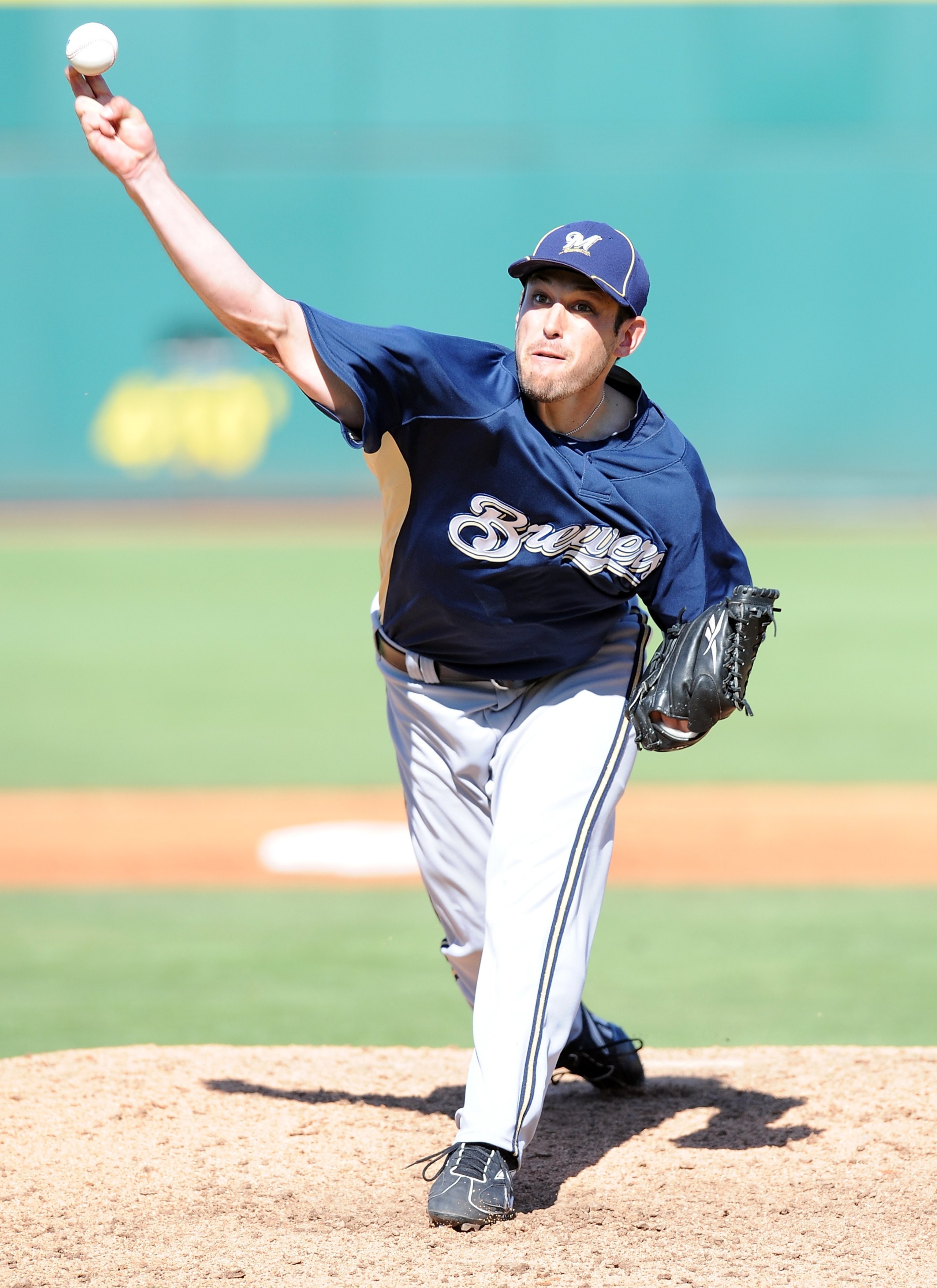 GOODYEAR, AZ - MARCH 11:  Mark Rogers #64 of the Milwaukee Brewers pitches during a Spring Training game against the Cincinnati Reds on March 11, 2010 at Goodyear Ballpark in Goodyear, Arizona.  (Photo by Lisa Blumenfeld/Getty Images)