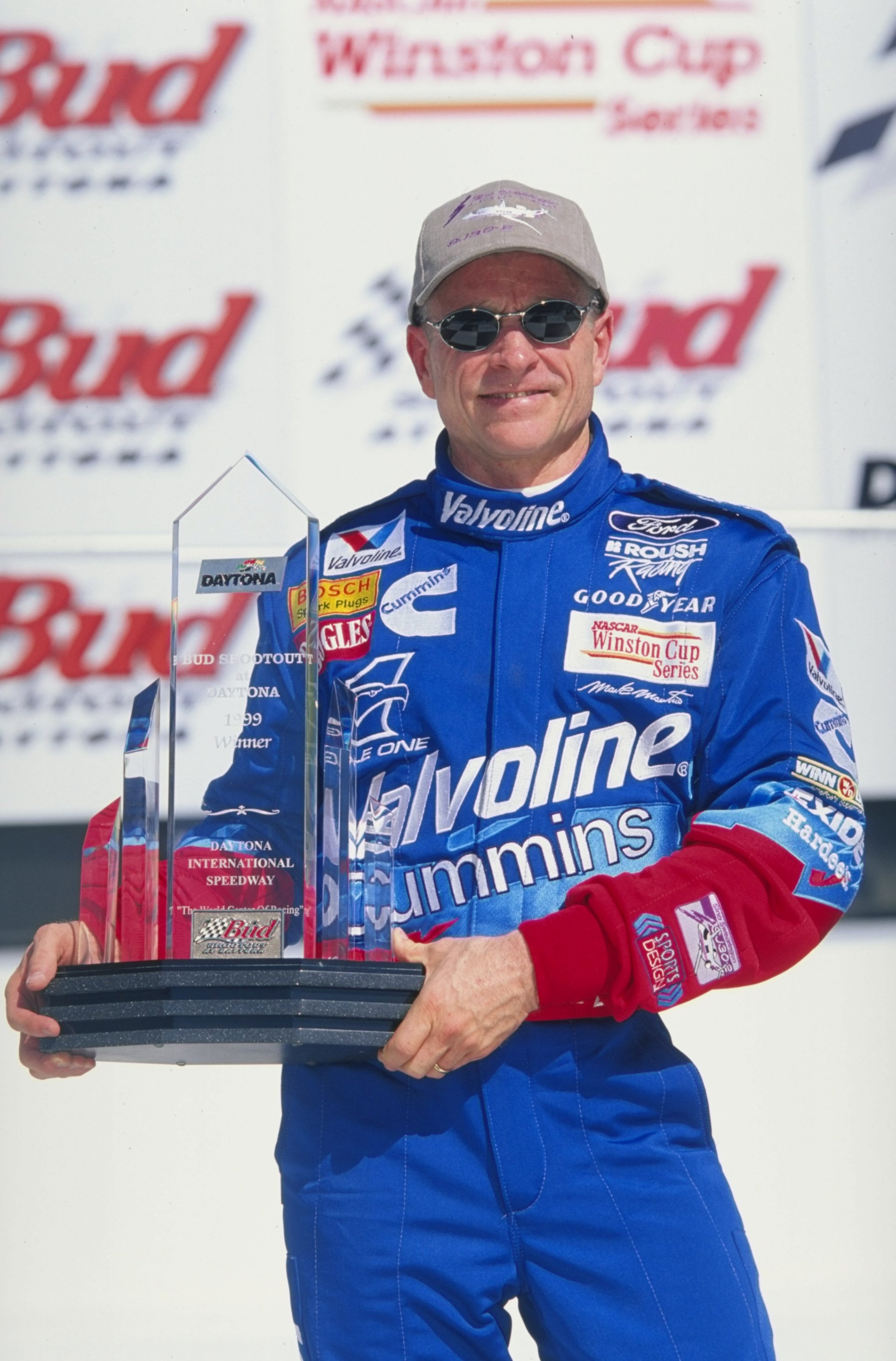 6 Feb 1999:  Mark Martin #6,  holds up his trophy after winning the Bud Shootout during the Daytona 500 Speedweek at the Daytona International Speedway in Daytona, Florida. Mandatory Credit: Jamie Squire  /Allsport