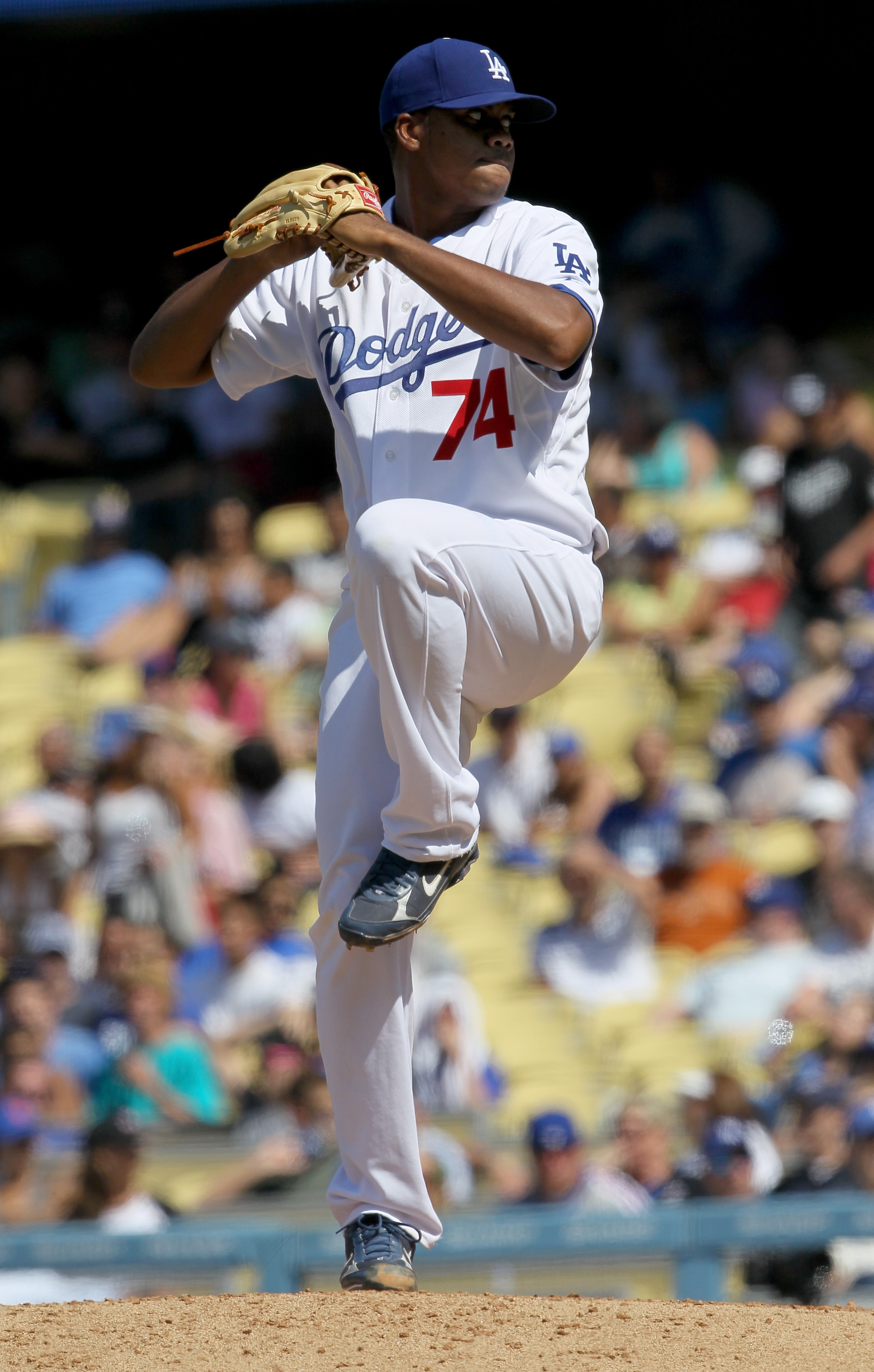 LOS ANGELES, CA - JULY 25:  Pitcher Kenley Jansen #74 of the Los Angeles Dodgers throws a pitch in the ninth inning on his way to picking up his first major league save in the game against the New York Mets on July 25, 2010 at Dodger Stadium in Los Angele