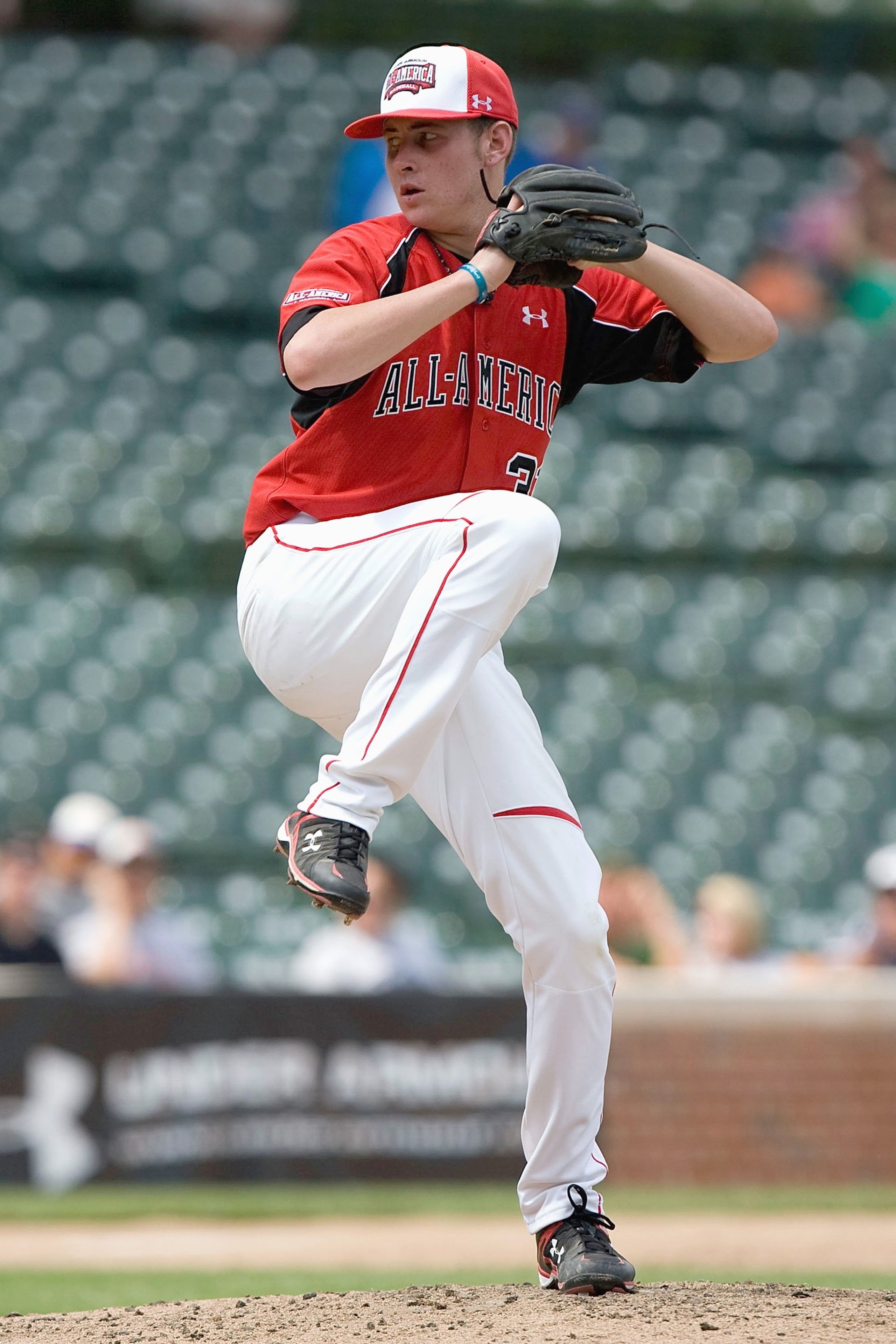 CHICAGO, IL - AUGUST 17: Tyler Matzek #31 of the Team One team (red jersey) pitches against of the Baseball Factory team during the Under Armour All-America Baseball Game at Wrigley Field on August 17, 2008 in Chicago, Illinois.  (Photo by Dilip Vishwanat