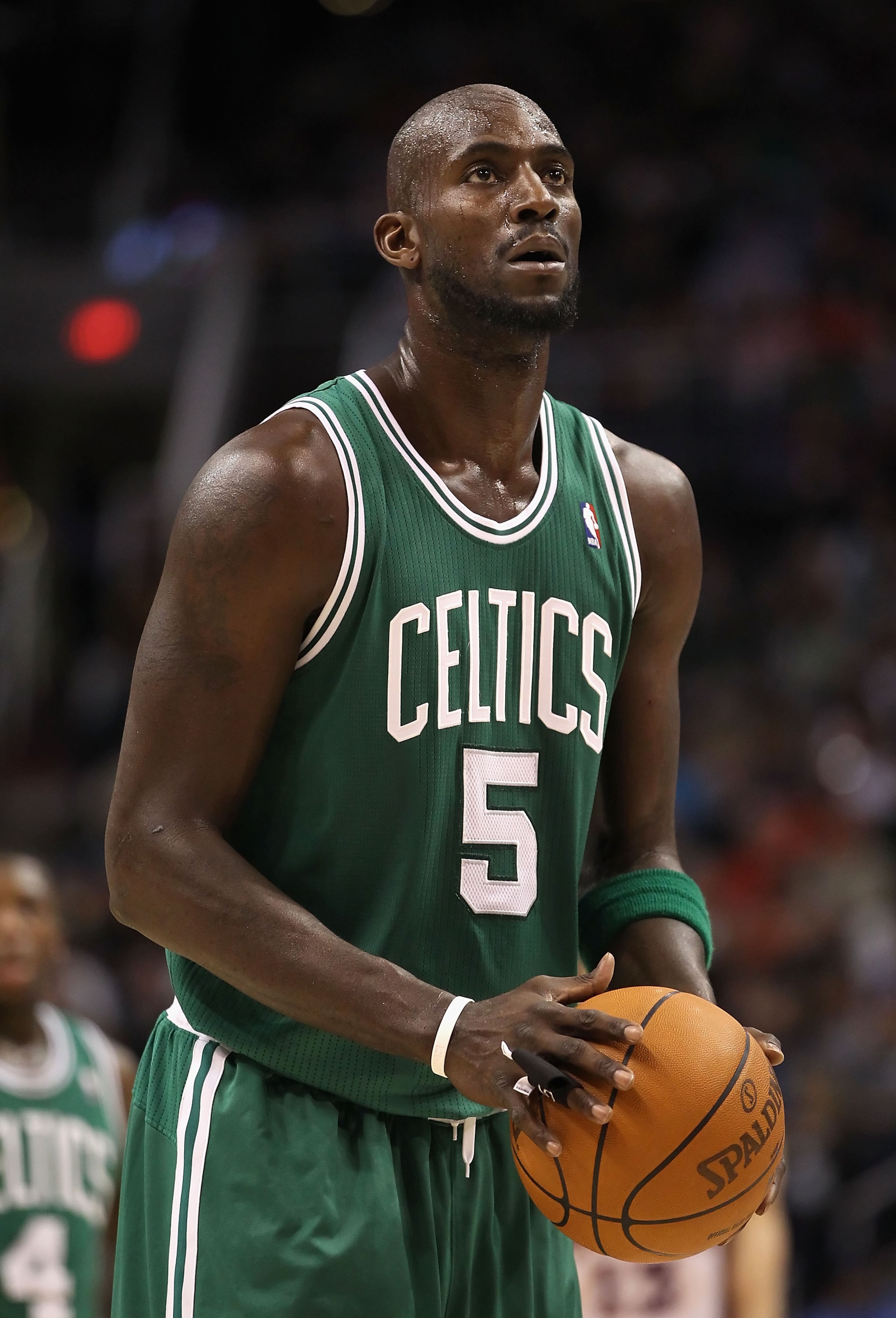 PHOENIX, AZ - JANUARY 28:  Kevin Garnett #5 of the Boston Celtics shoots a free throw shot during the NBA game against the Phoenix Suns at US Airways Center on January 28, 2011 in Phoenix, Arizona.  The Suns defeated the Celtics 88-71.  NOTE TO USER: User