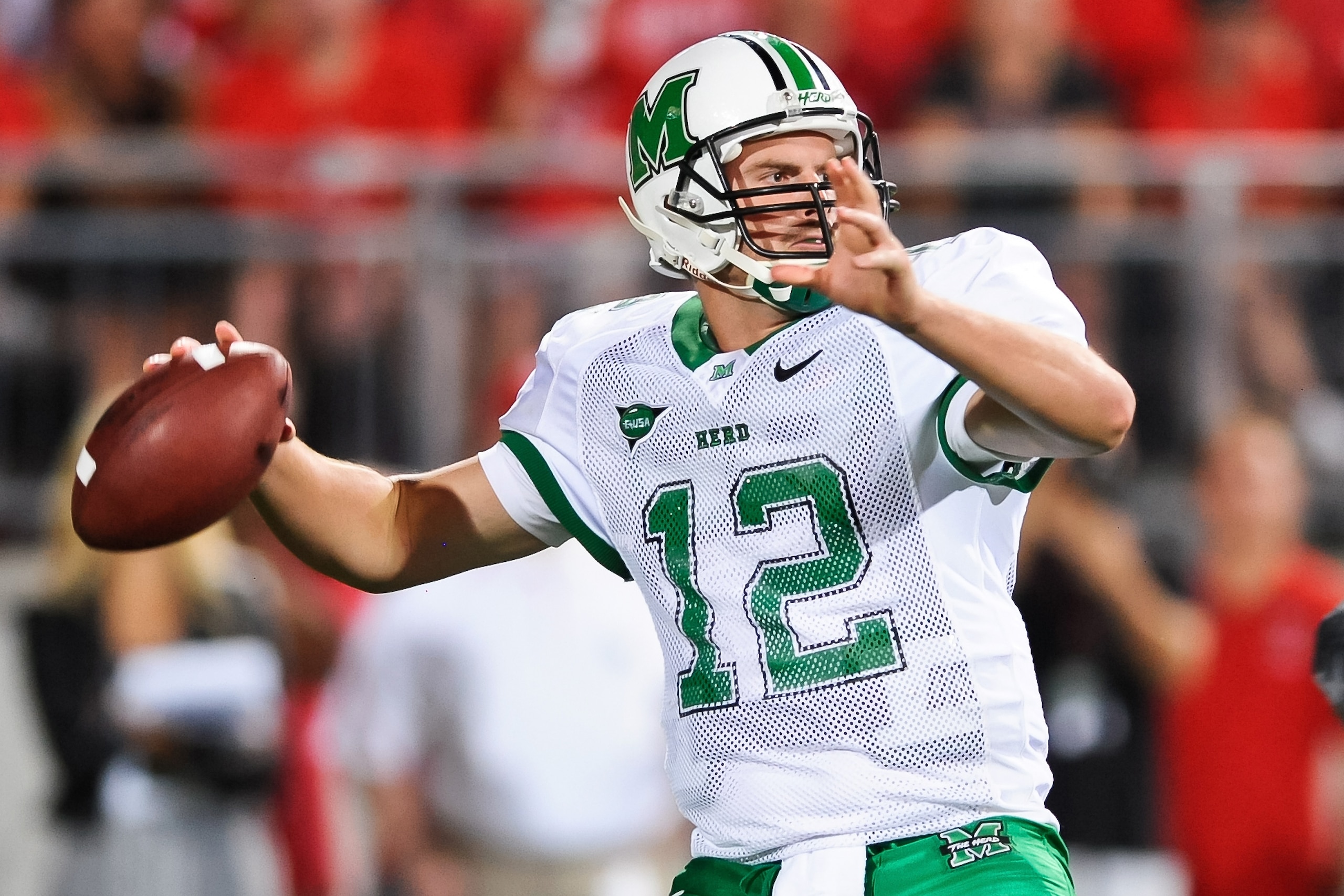 COLUMBUS, OH - SEPTEMBER 2: Quarterback Brian Anderson #12 of the Marshall Thundering Herd passes against the Ohio State Buckeyes at Ohio Stadium on September 2, 2010 in Columbus, Ohio. (Photo by Jamie Sabau/Getty Images)