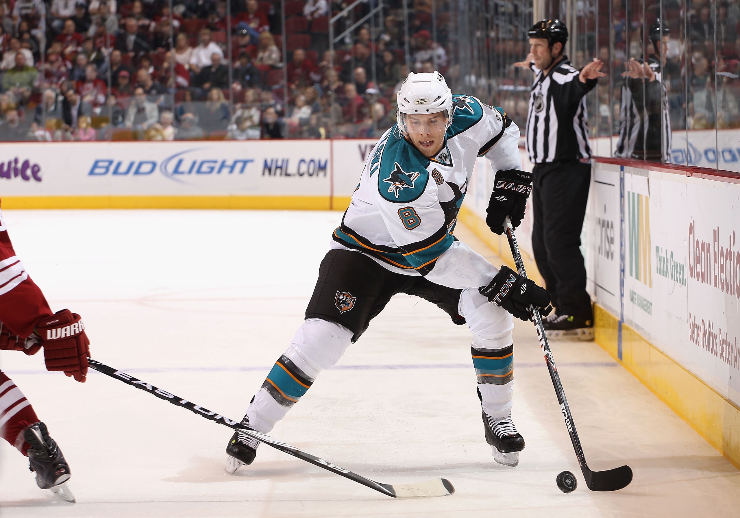 GLENDALE, AZ - JANUARY 17:  Joe Pavelski #8 of the San Jose Sharks skates with the puck during the NHL game against the Phoenix Coyotes at Jobing.com Arena on January 17, 2011 in Glendale, Arizona.  The Sharks defeated the Coyotes 4-2.  (Photo by Christia