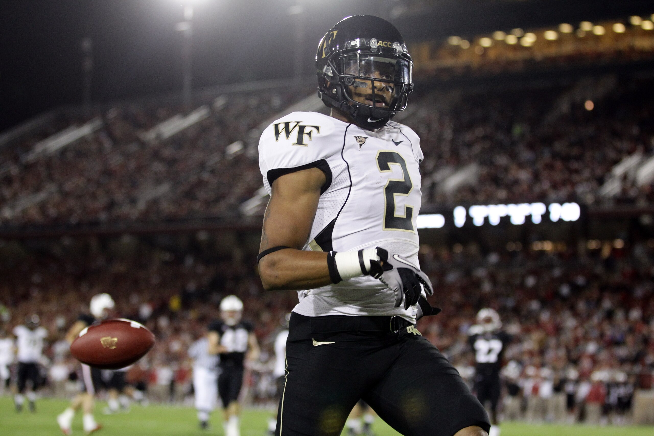 PALO ALTO, CA - SEPTEMBER 18:  Chris Givens #2 of the Wake Forest Demon Deacons runs in for a touchdown against the Stanford Cardinal at Stanford Stadium on September 18, 2010 in Palo Alto, California.  (Photo by Ezra Shaw/Getty Images)
