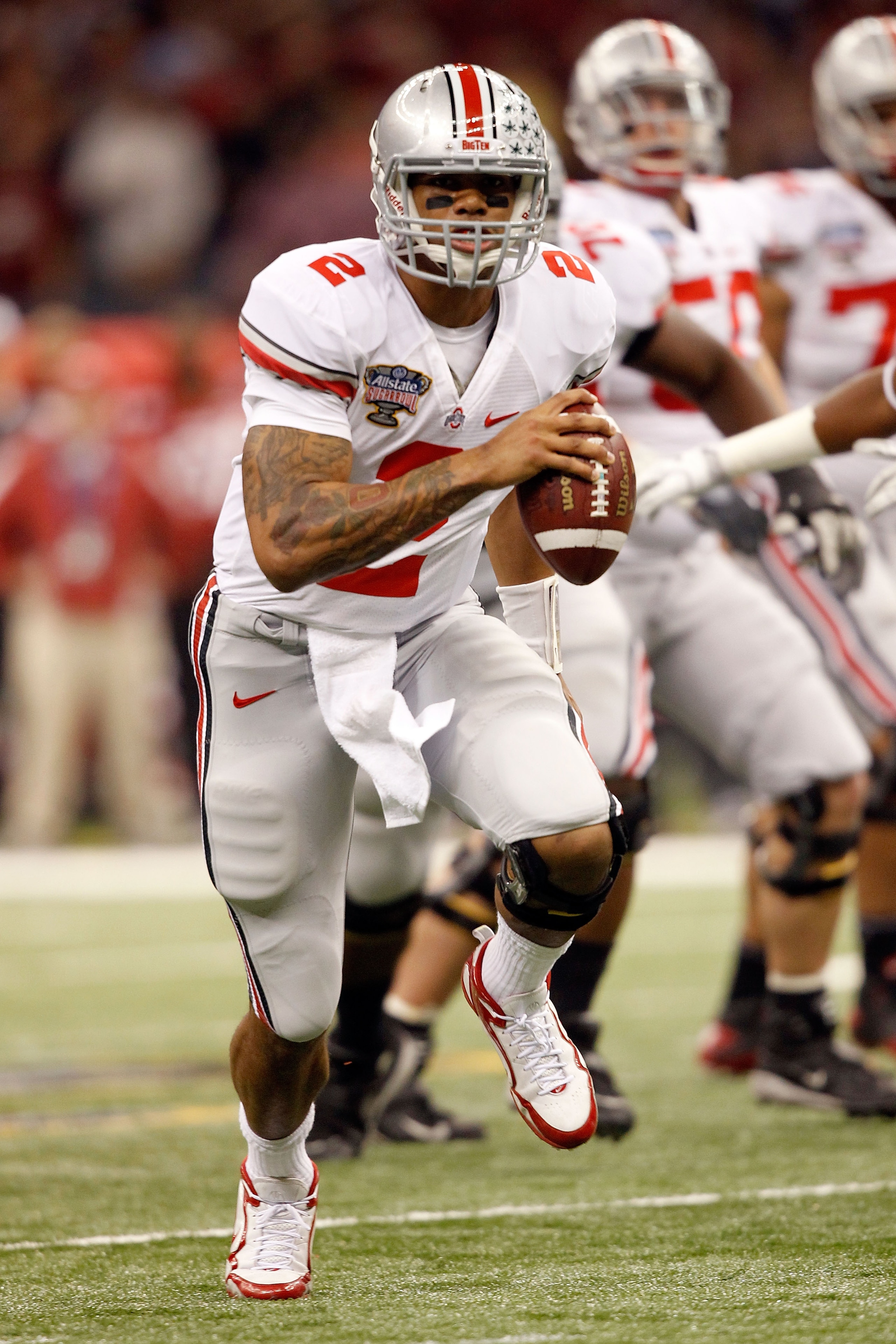 NEW ORLEANS, LA - JANUARY 04:  Terrelle Pryor #2 of the Ohio State Buckeyes runs with the football against the Arkansas Razorbacks in the first quarter during the Allstate Sugar Bowl at the Louisiana Superdome on January 4, 2011 in New Orleans, Louisiana.