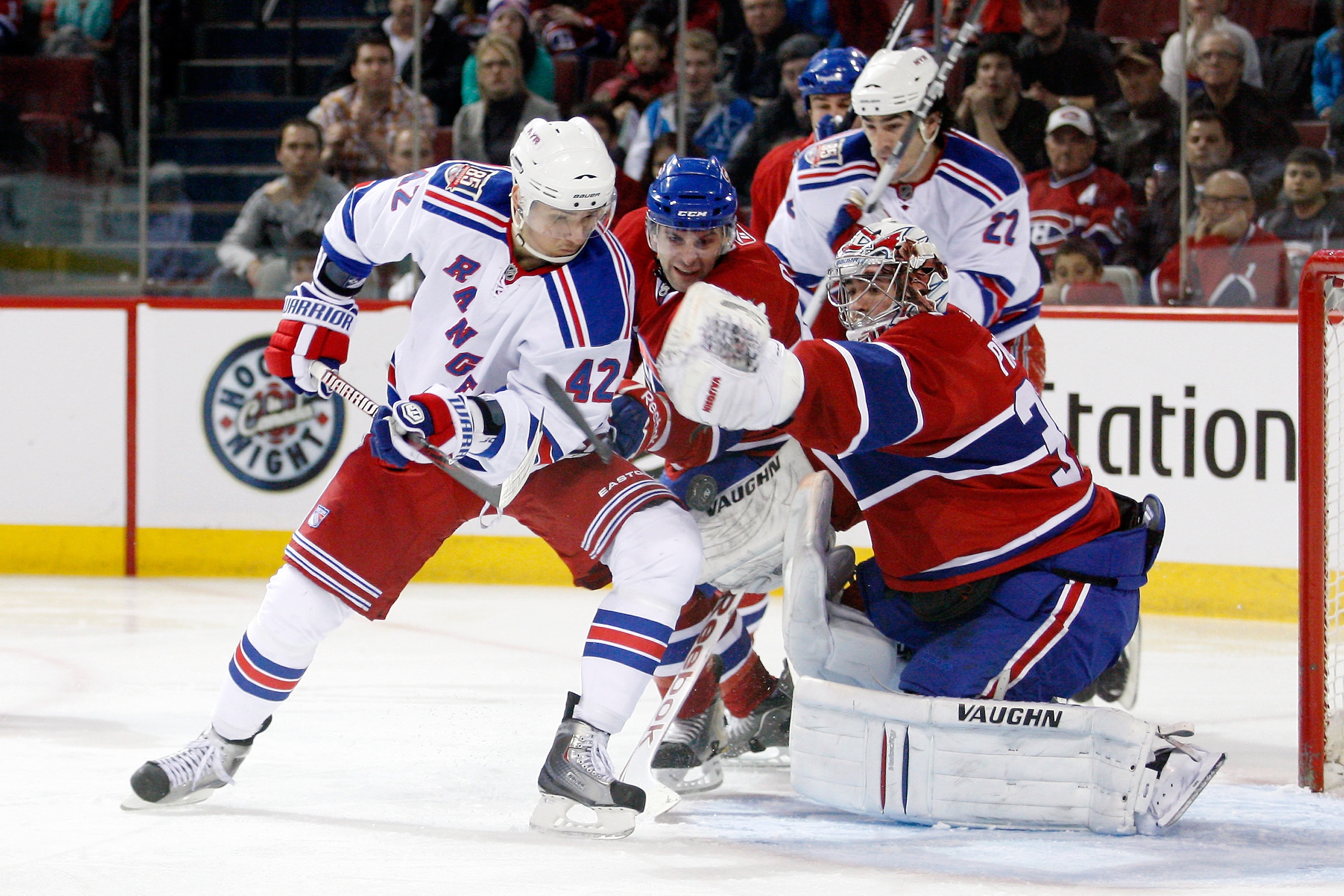 MONTREAL, CANADA - FEBRUARY 5: Artem Anisimov #42 of the New York Rangers and Carey Price #31 of the Montreal Canadiens watch the loose puck during the NHL game at the Bell Centre on February 5, 2011 in Montreal, Quebec, Canada. The Canadiens defeated t MONTREAL, CANADA - FEBRUARY 5: Artem Anisimov #42 of the New York Rangers and Carey Price #31 of the Montreal Canadiens watch the loose puck during the NHL game at the Bell Centre on February 5, 2011 in Montreal, Quebec, Canada. The Canadiens defeated t