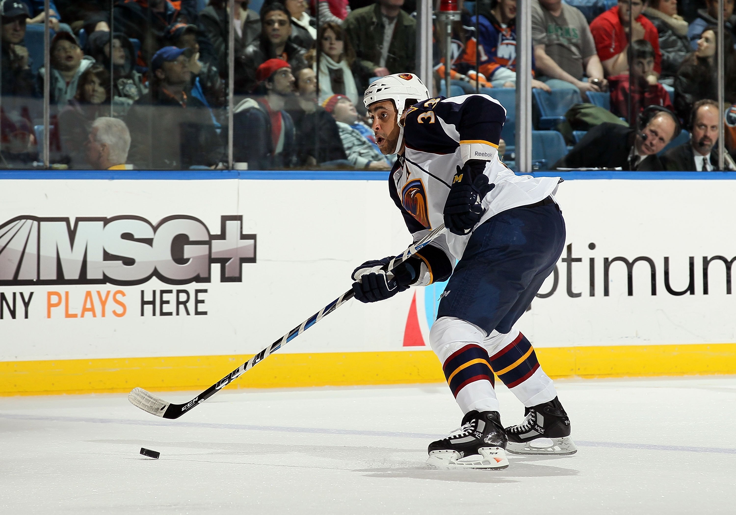 UNIONDALE, NY - DECEMBER 11:  Dustin Byfuglien #33 of the Atlanta Thrashers skates against the New York Islanders on December 11, 2010 at Nassau Coliseum in Uniondale, New York. The Thrashers defeated the Isles 5-4.  (Photo by Jim McIsaac/Getty Images)