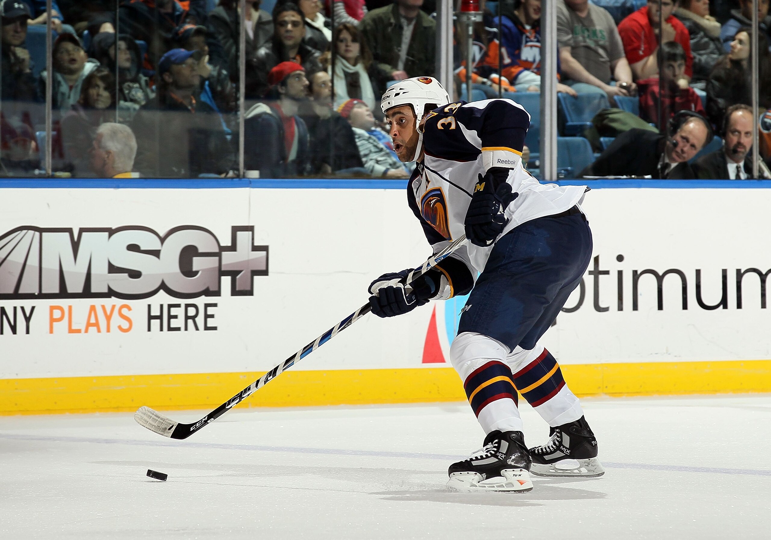 UNIONDALE, NY - DECEMBER 11: Dustin Byfuglien #33 of the Atlanta Thrashers skates against the New York Islanders on December 11, 2010 at Nassau Coliseum in Uniondale, New York. The Thrashers defeated the Isles 5-4. (Photo by Jim McIsaac/Getty Images) UNIONDALE, NY - DECEMBER 11: Dustin Byfuglien #33 of the Atlanta Thrashers skates against the New York Islanders on December 11, 2010 at Nassau Coliseum in Uniondale, New York. The Thrashers defeated the Isles 5-4. (Photo by Jim McIsaac/Getty Images)