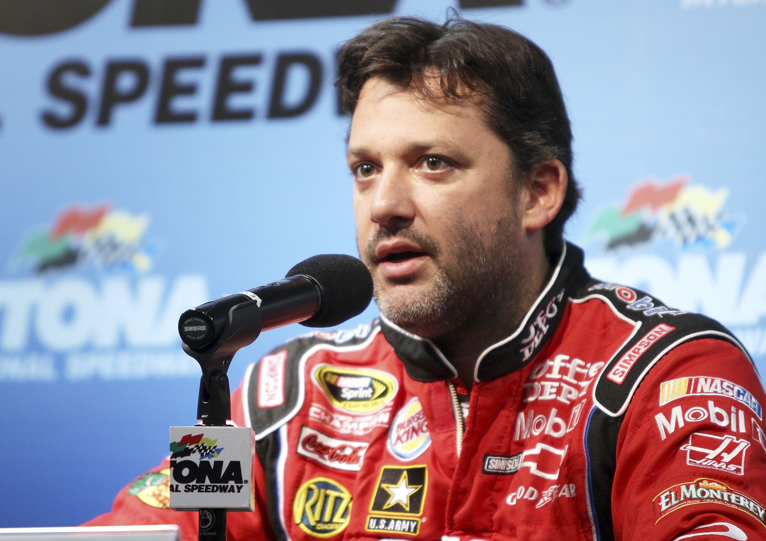 DAYTONA BEACH, FL - JANUARY 20:  Tony Stewart, driver of the #14 Office Depot Chevrolet addreese the media at Daytona International Speedway on January 20, 2011 in Daytona Beach, Florida.  (Photo by Jerry Markland/Getty Images for NASCAR)